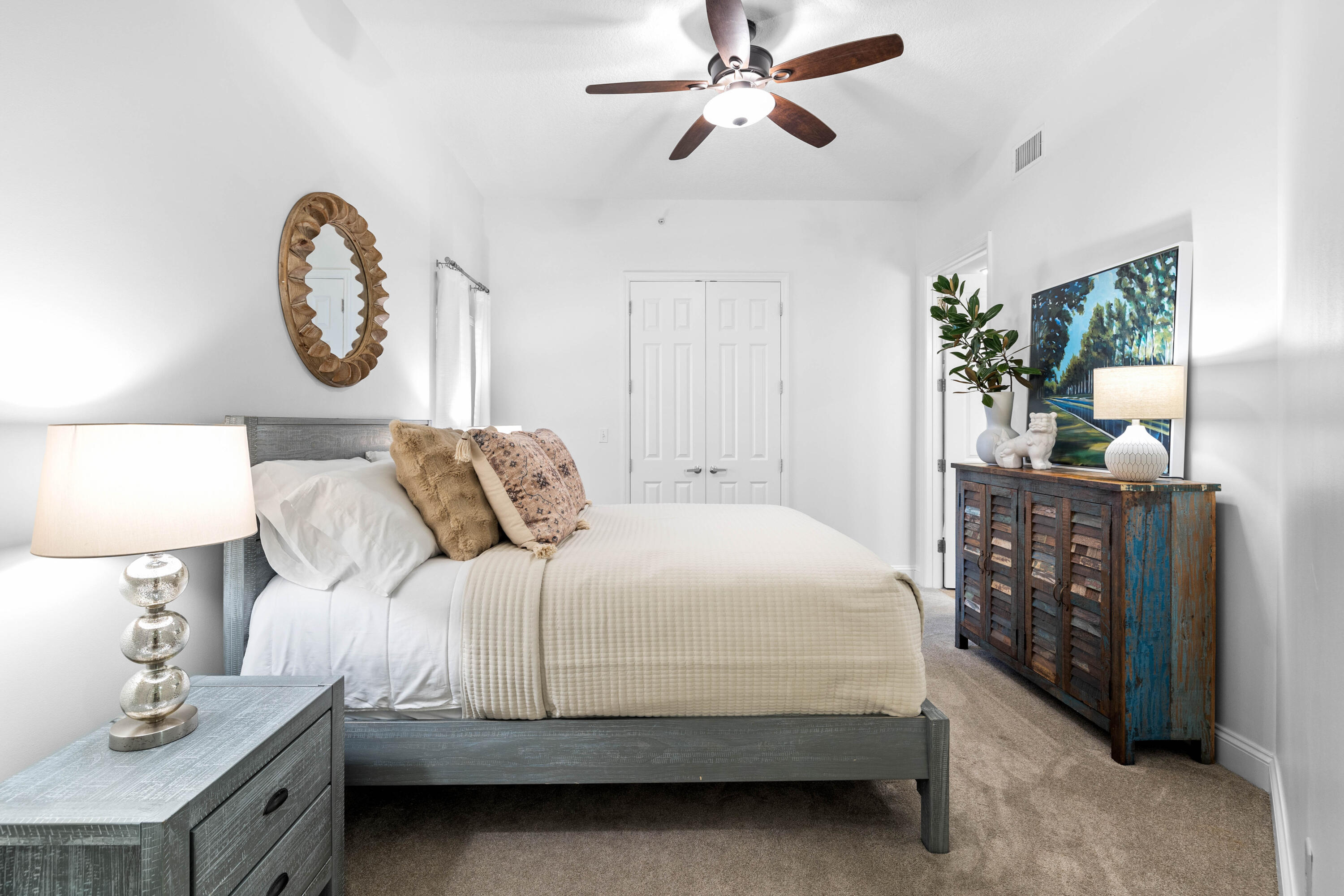 9961 East County Highway 30A, Unit 205 Inlet Beach, FL 32461 - Photo 26 of 45 a bedroom with a bed and a chandelier