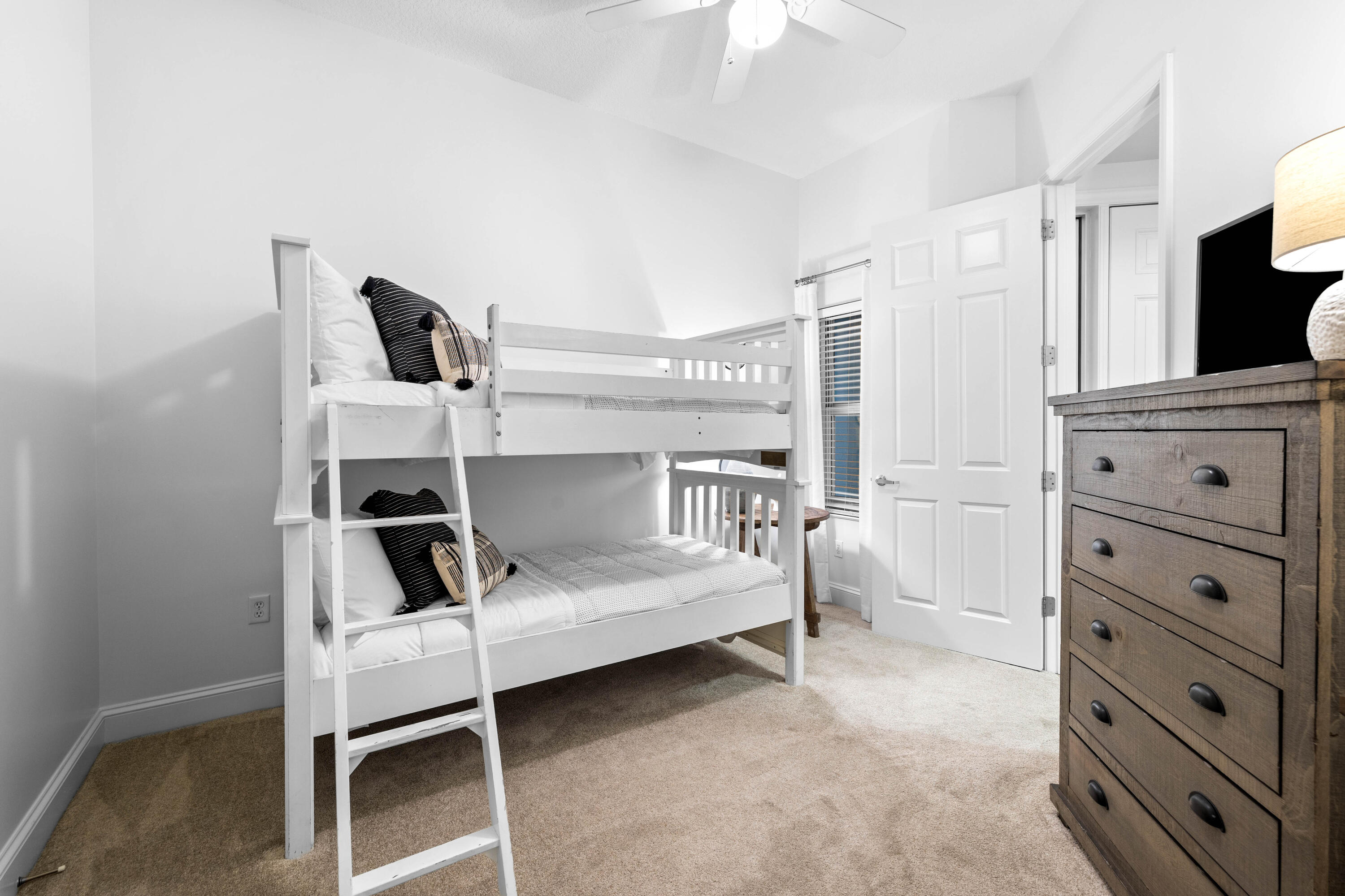 9961 East County Highway 30A, Unit 205 Inlet Beach, FL 32461 - Photo 30 of 45 a bedroom with a bed and a television