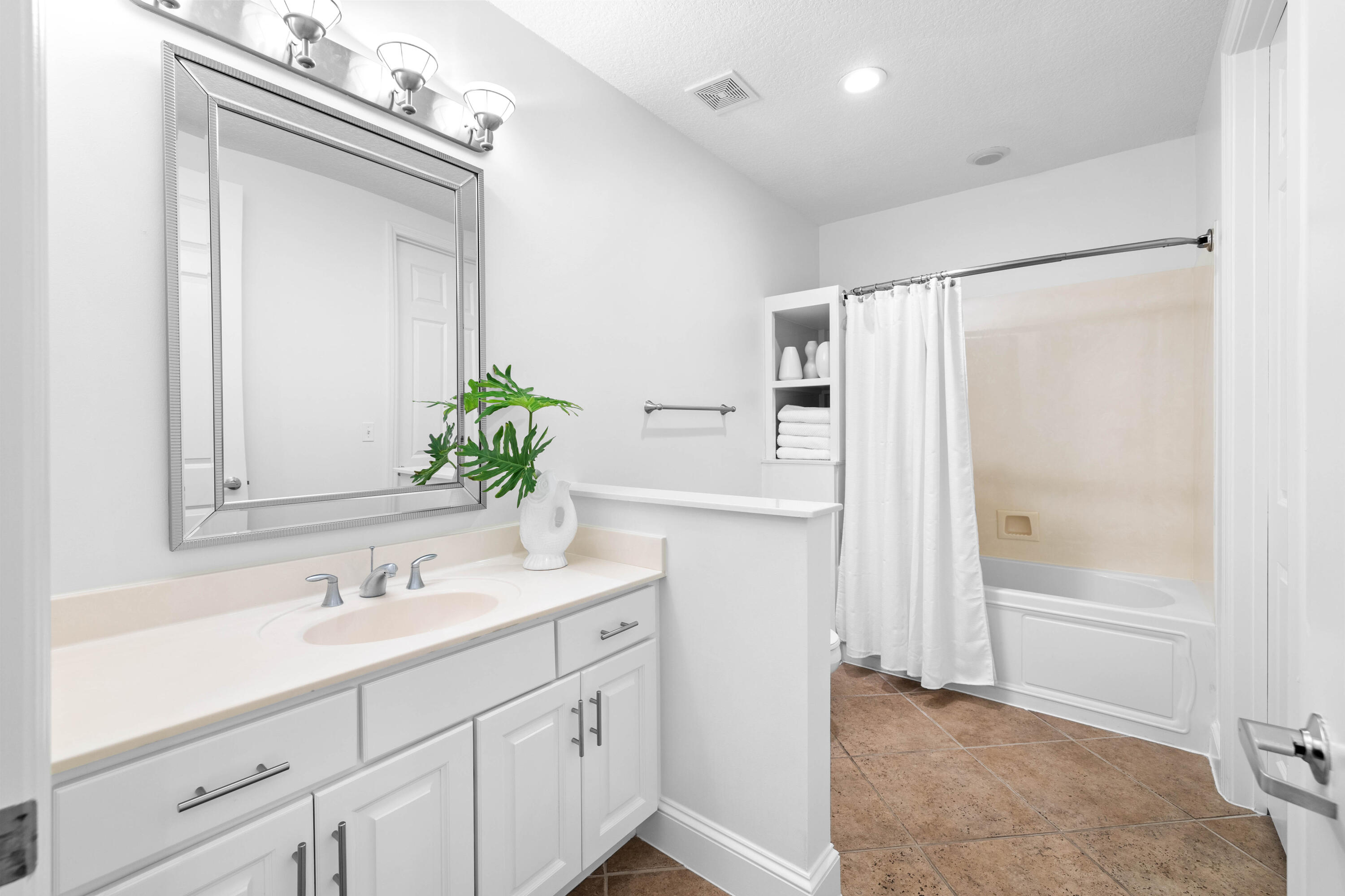 9961 East County Highway 30A, Unit 205 Inlet Beach, FL 32461 - Photo 32 of 45 a bathroom with a sink vanity and a mirror
