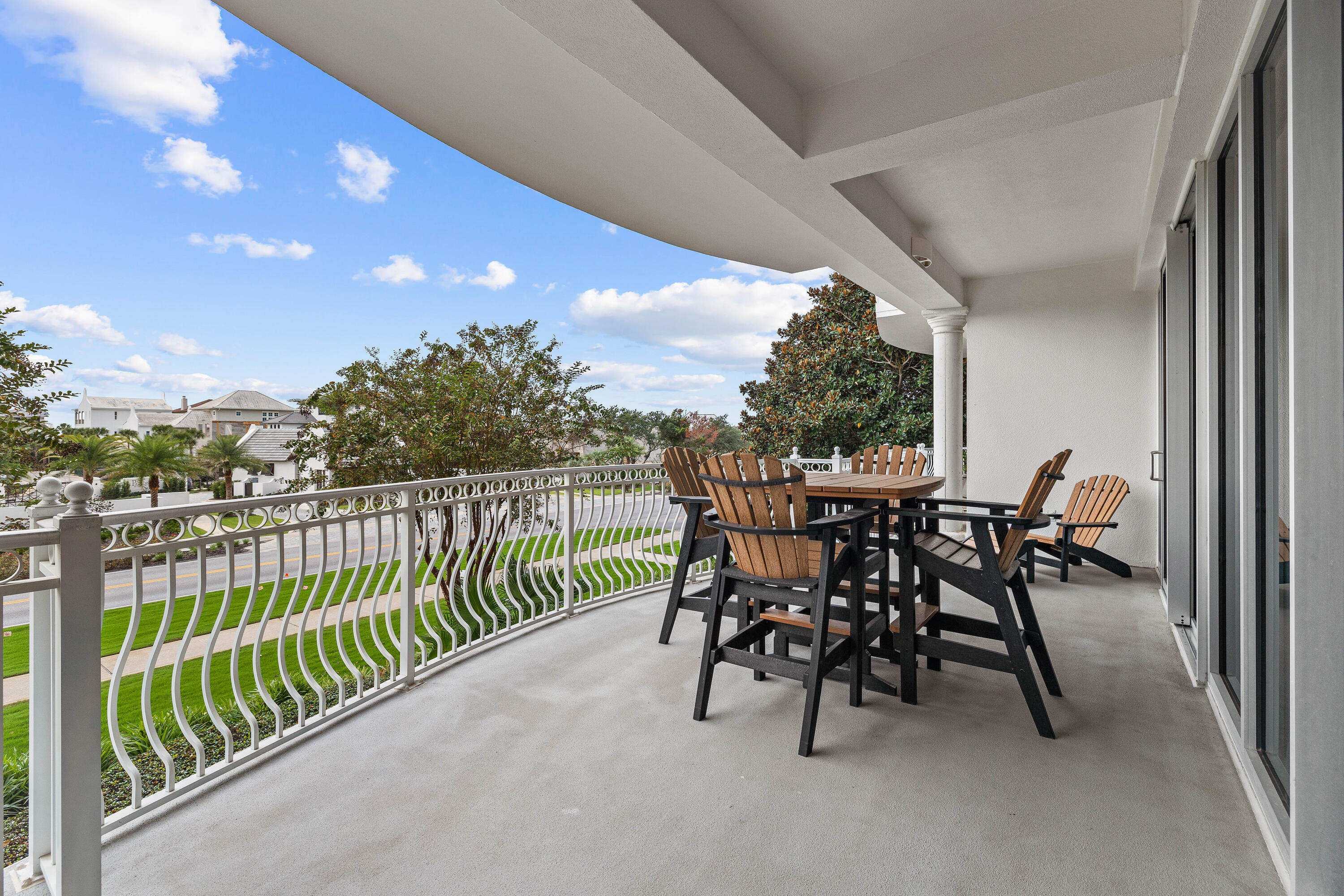 9961 East County Highway 30A, Unit 205 Inlet Beach, FL 32461 - Photo 34 of 45 a view of a porch with furniture and a yard