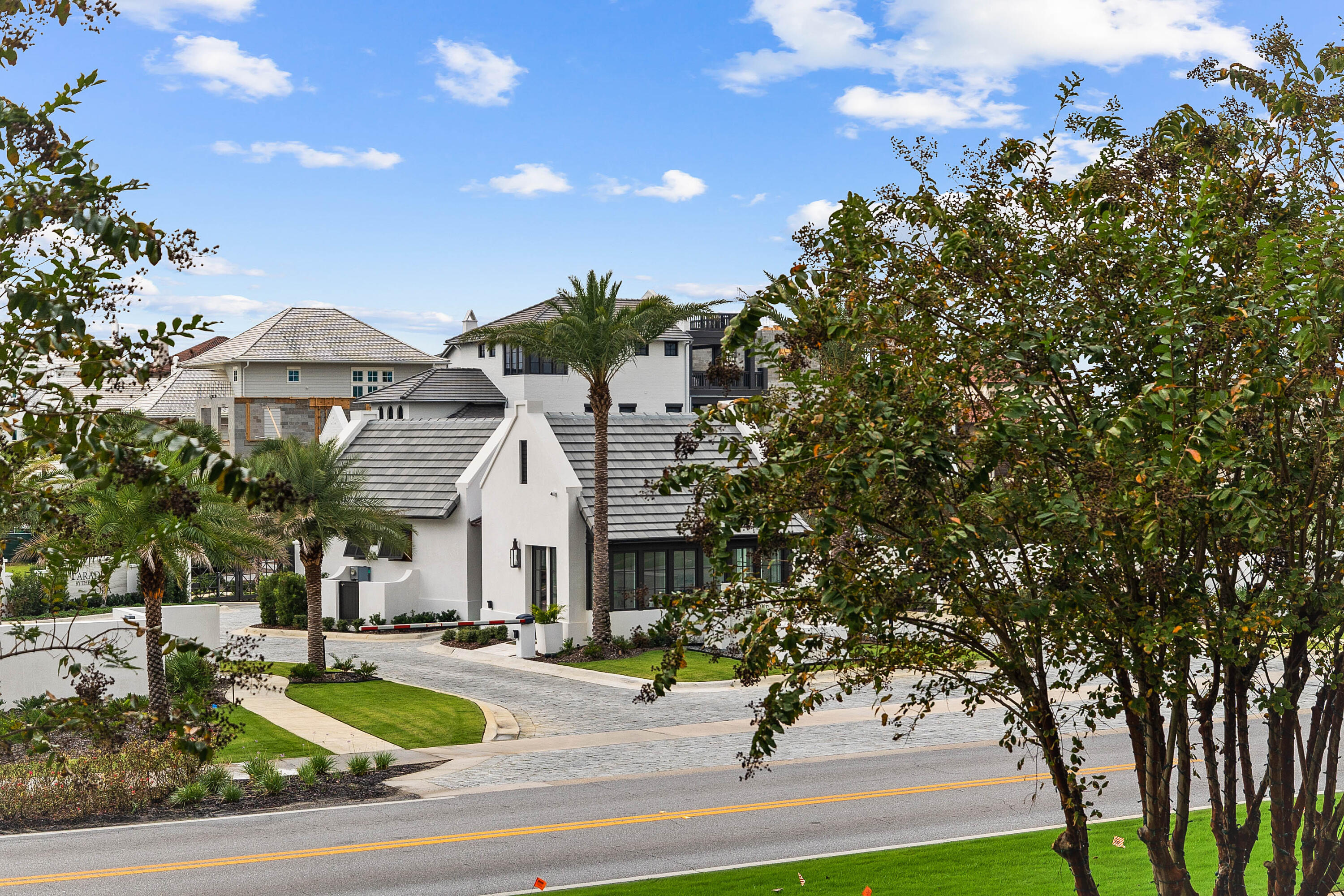 9961 East County Highway 30A, Unit 205 Inlet Beach, FL 32461 - Photo 43 of 45 a front view of a house with swimming pool and porch