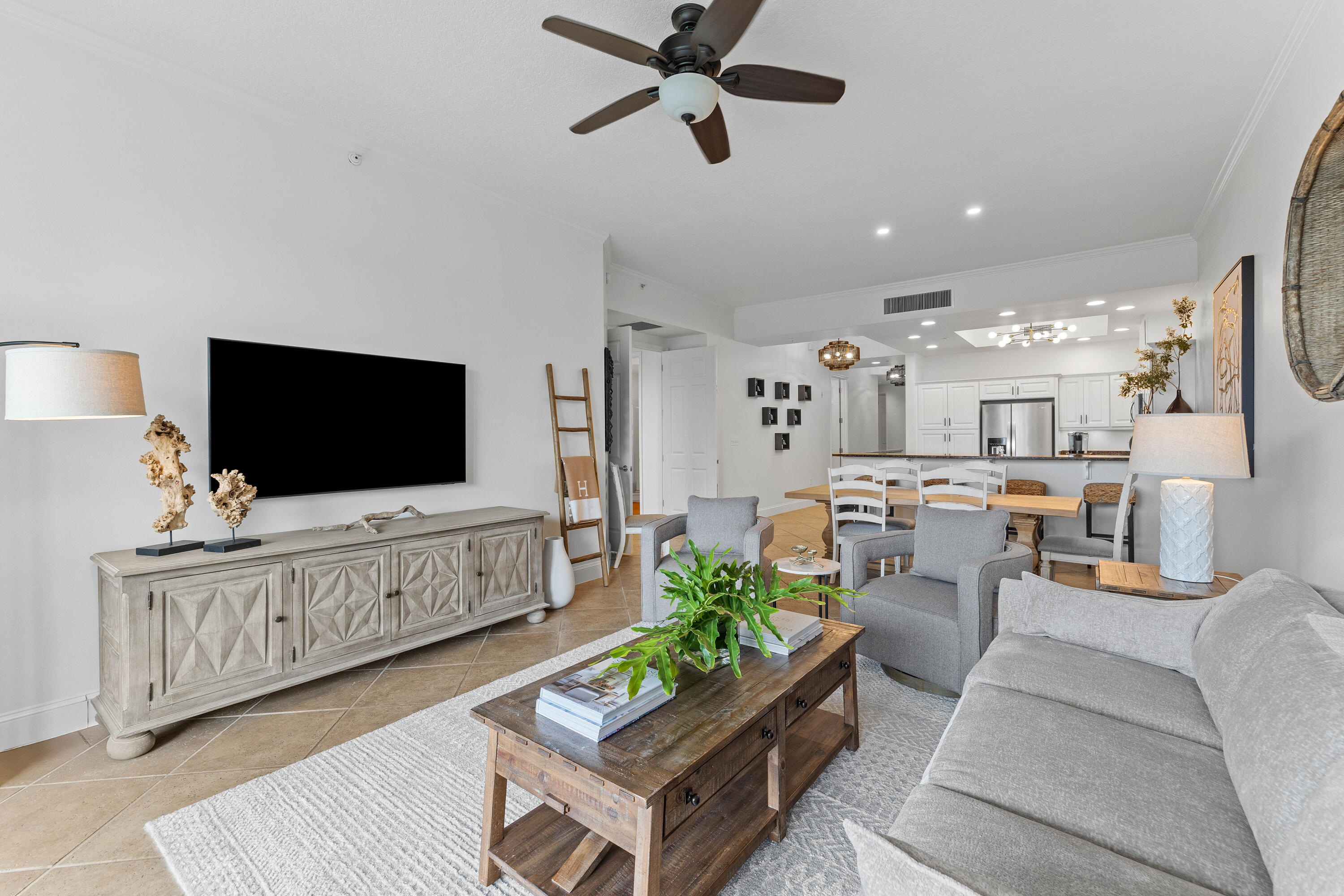 9961 East County Highway 30A, Unit 205 Inlet Beach, FL 32461 - Photo 5 of 45 a living room with furniture and a flat screen tv