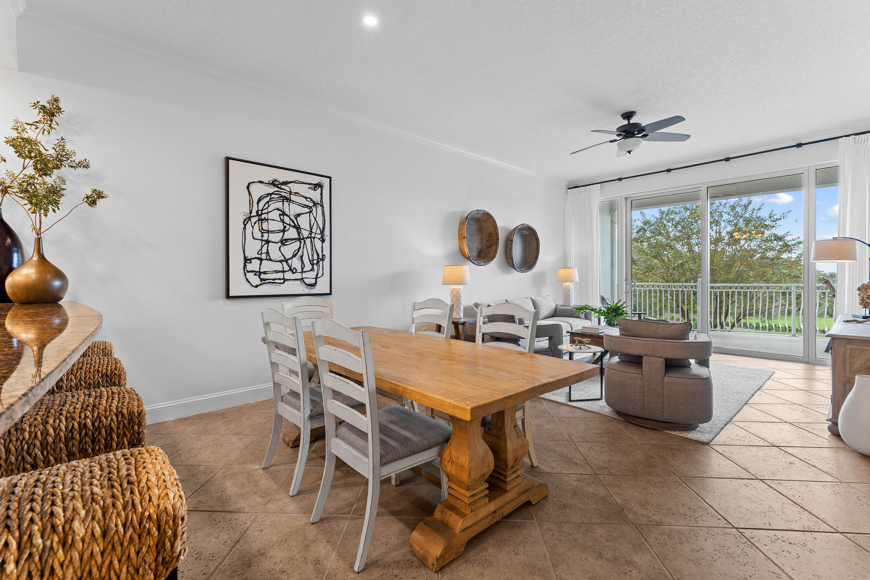 9961 East County Highway 30A, Unit 205 Inlet Beach, FL 32461 - Photo 8 of 45 a dining room with furniture and a floor to ceiling window