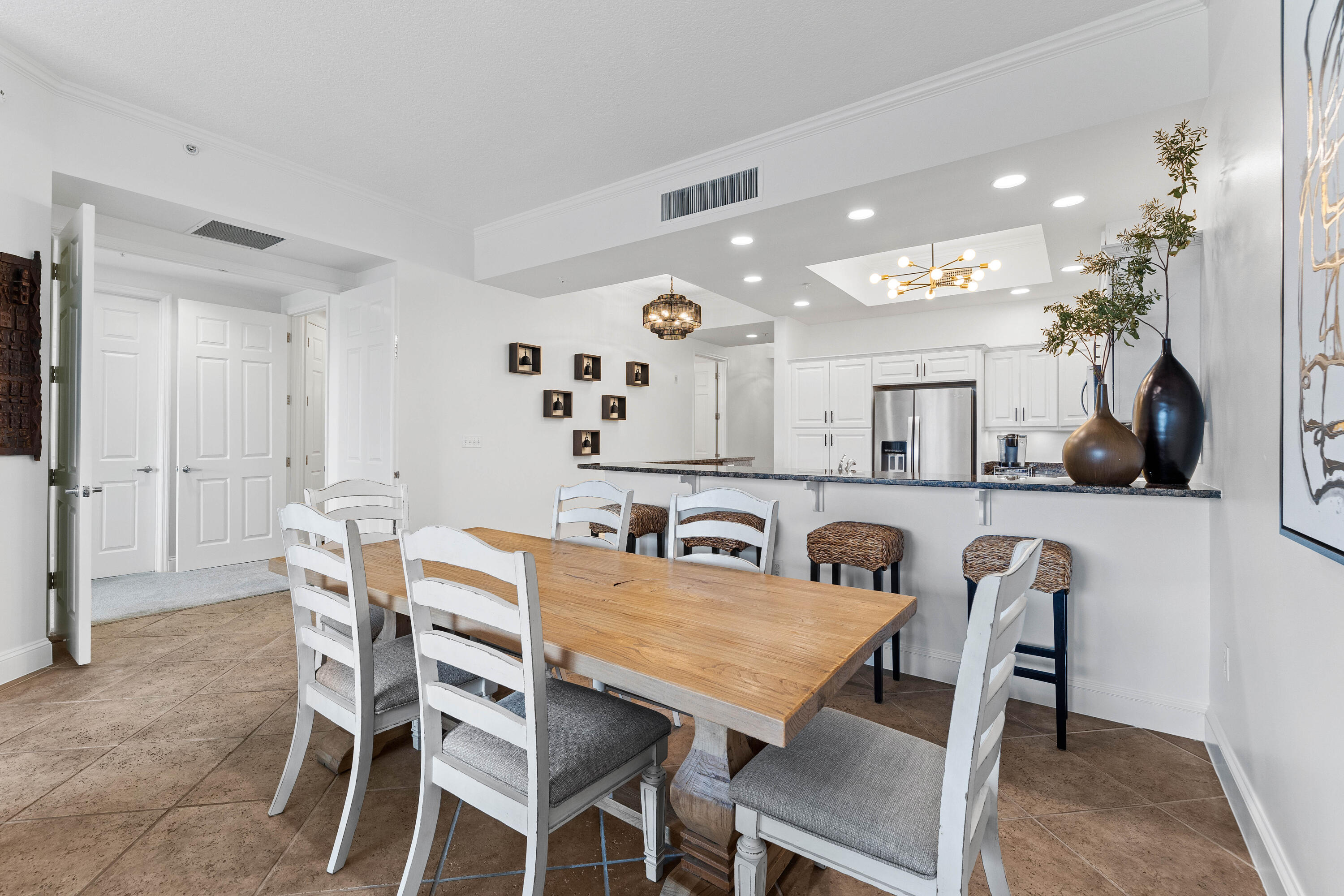 9961 East County Highway 30A, Unit 205 Inlet Beach, FL 32461 - Photo 10 of 45 a view of a dining room with furniture and wooden floor