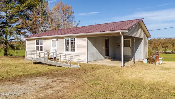 a view of a house with a patio