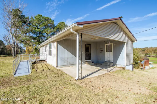 a view of a house with a patio