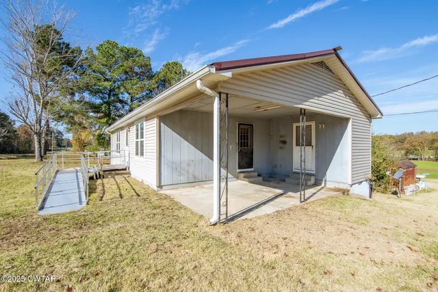 a view of a house with a patio