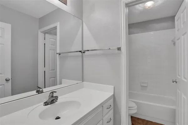 a bathroom with a sink and a tub