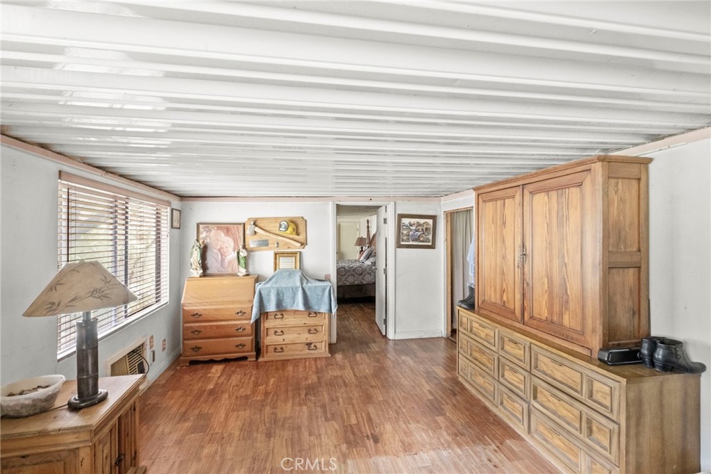42185 Oak Canyon Road Hemet, CA 92544 - Photo 11 of 42 a bedroom with furniture and window
