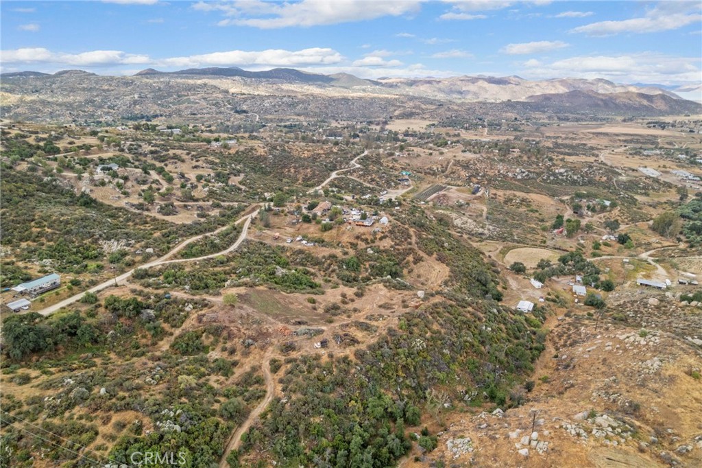 42185 Oak Canyon Road Hemet, CA 92544 - Photo 32 of 42 an aerial view of residential houses with city view and green space