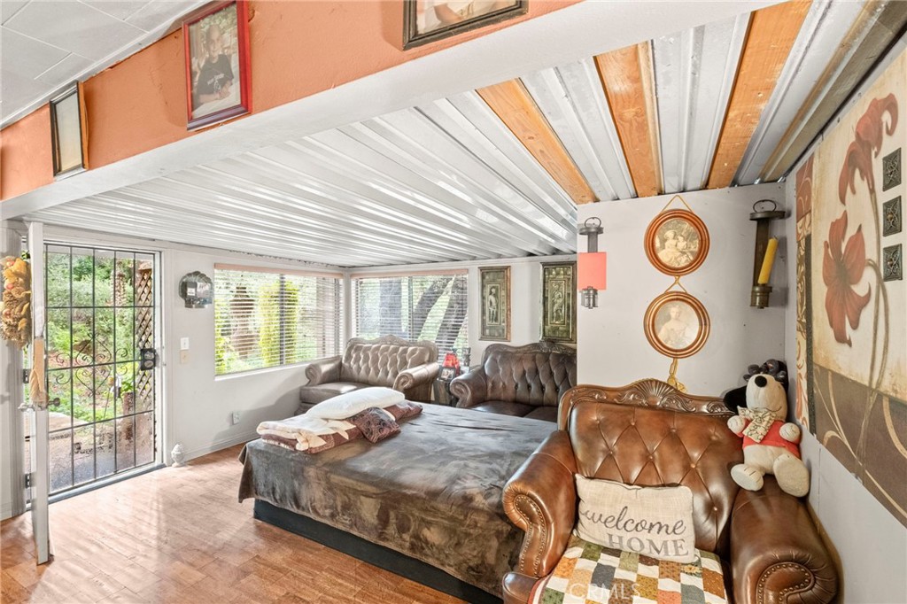 42185 Oak Canyon Road Hemet, CA 92544 - Photo 7 of 42 a living room with couch and a large window