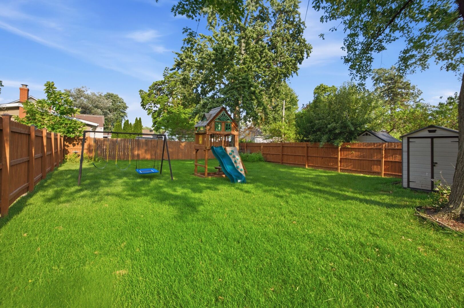 913 Church Road Aurora, IL 60505 - Photo 26 of 31 a view of a backyard with a garden