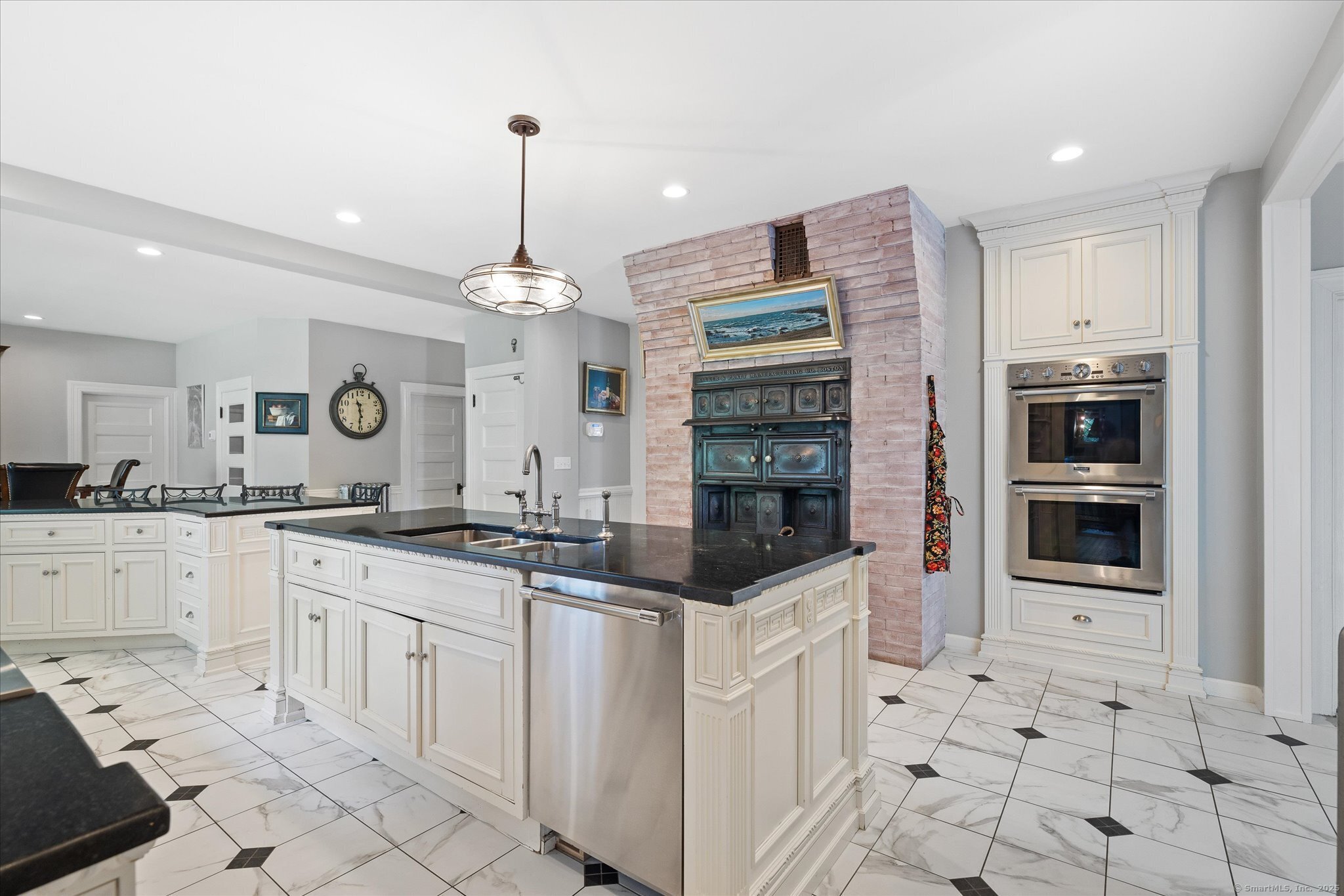 357 Wrights Crossing Road Pomfret, CT 06259 - Photo 14 of 40 a kitchen with granite countertop a sink and cabinets
