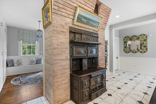 a kitchen with stainless steel appliances granite countertop a stove and a refrigerator