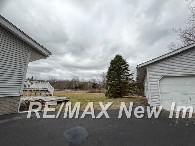 312 Chip Road Auburn, MI 48611 - Photo 3 of 17 50203480-60e6e0db-745e-418f-8196-d10e7ec72ab0.JPG