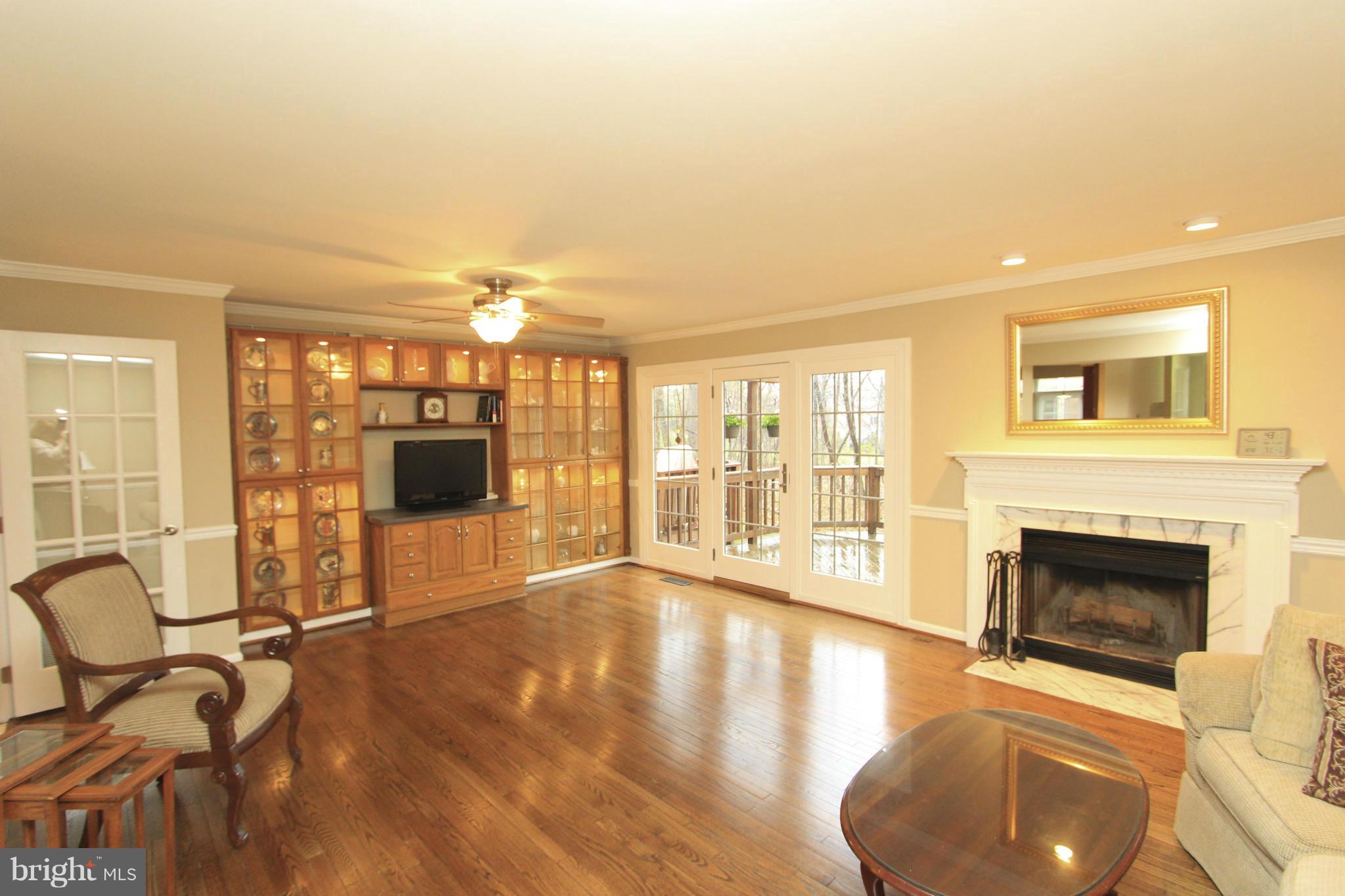 3817 Inverness Road Fairfax, VA 22033 - Photo 6 of 30 Living Room with Wood-burning Fireplace