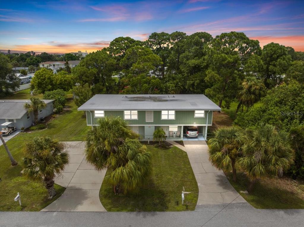 307 Winfield Way Nokomis, FL 34275 - Photo 2 of 58 a view of a house with a yard