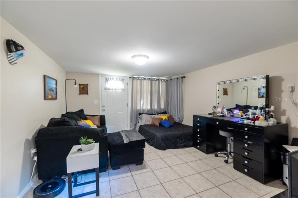 307 Winfield Way Nokomis, FL 34275 - Photo 34 of 58 a living room with furniture and wooden floor