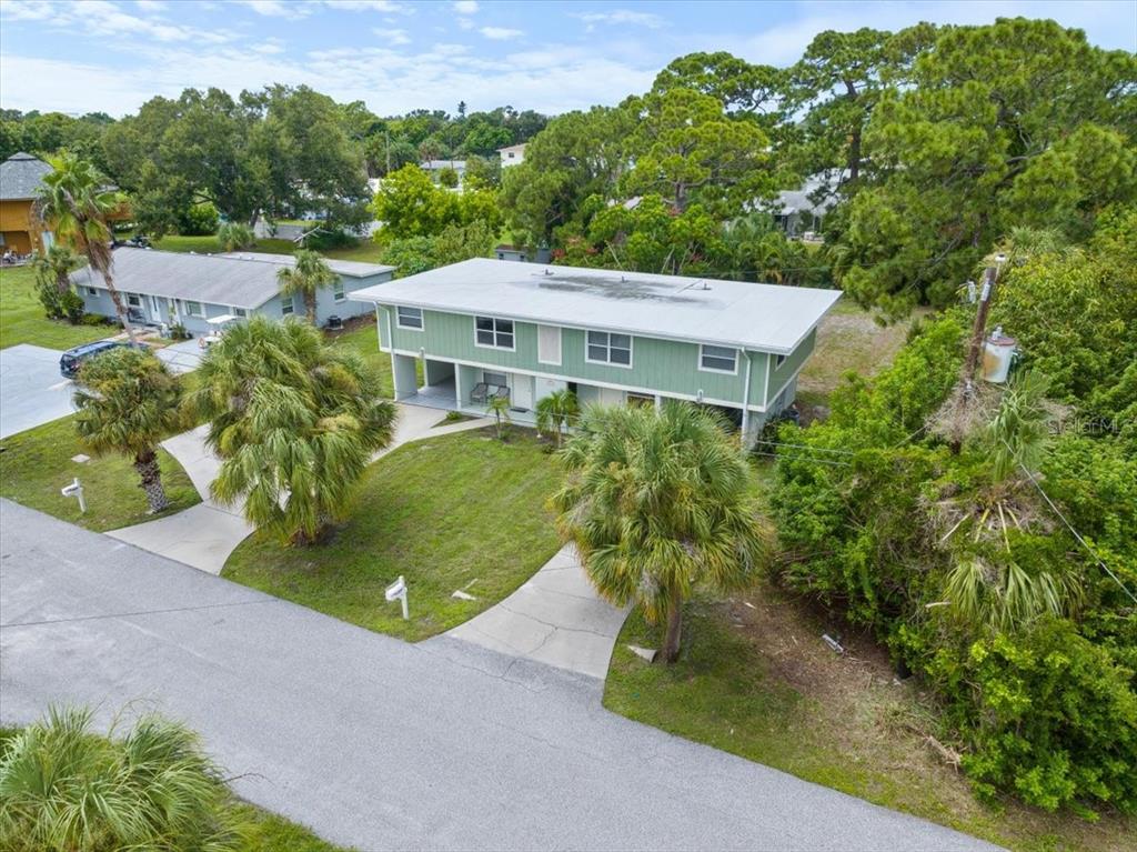 307 Winfield Way Nokomis, FL 34275 - Photo 38 of 58 an aerial view of a house with yard and green space