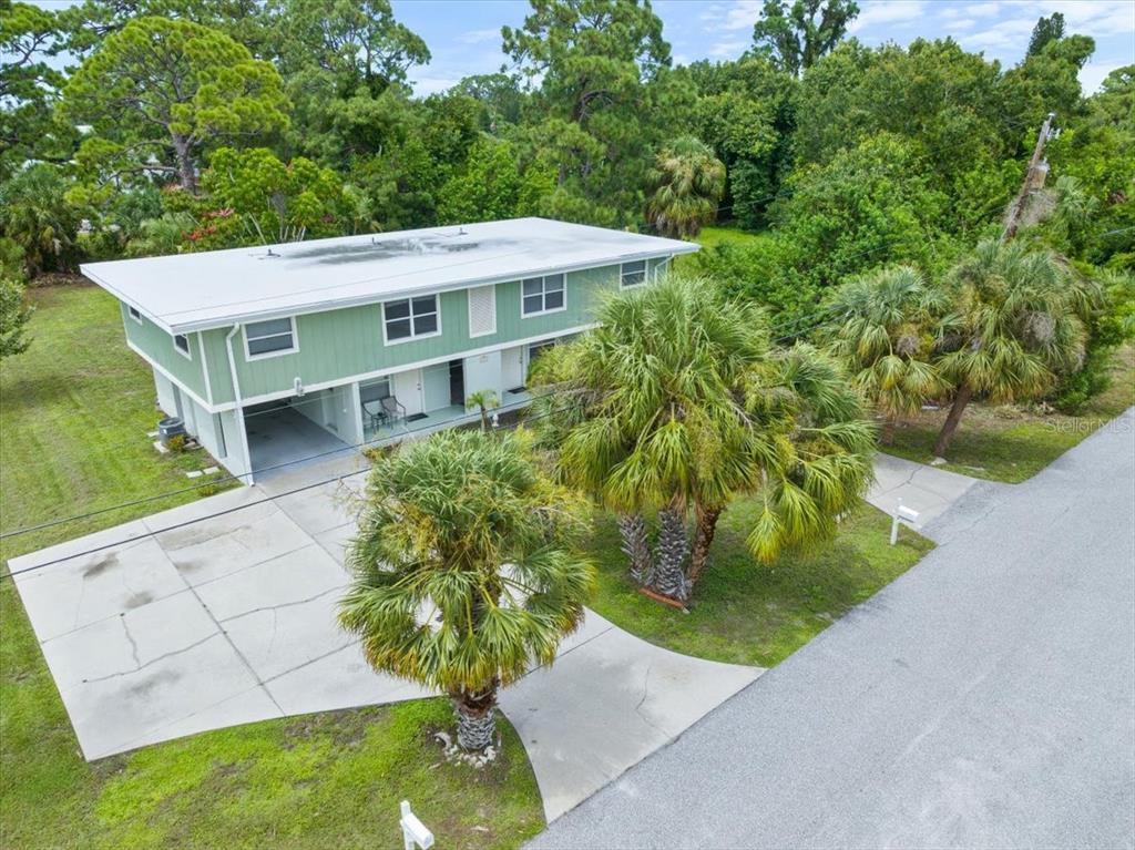 307 Winfield Way Nokomis, FL 34275 - Photo 39 of 58 a view of a house with a yard