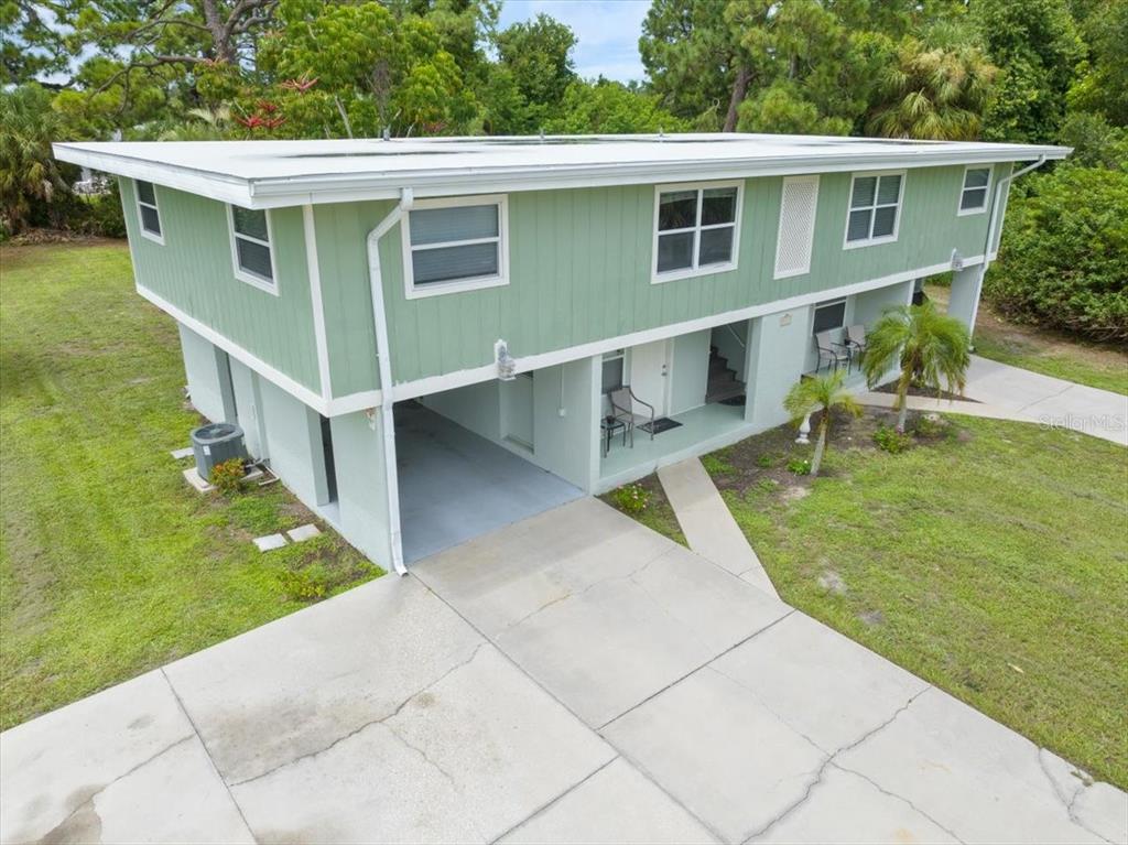 307 Winfield Way Nokomis, FL 34275 - Photo 40 of 58 aerial view of a house with a yard