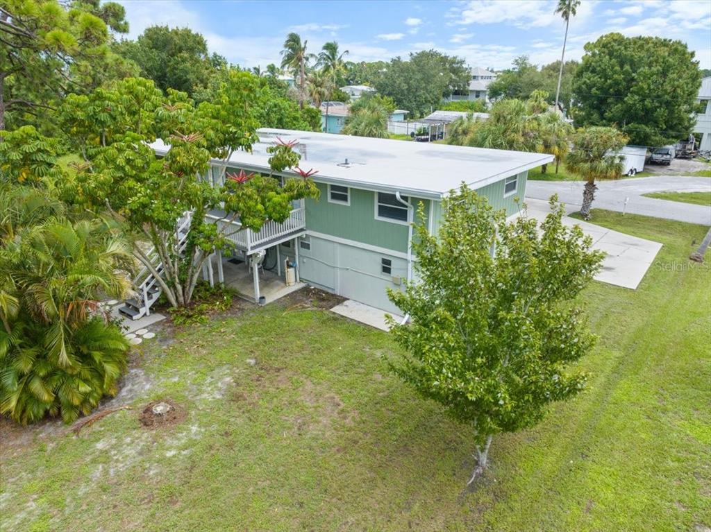 307 Winfield Way Nokomis, FL 34275 - Photo 41 of 58 an aerial view of a house with swimming pool garden and patio