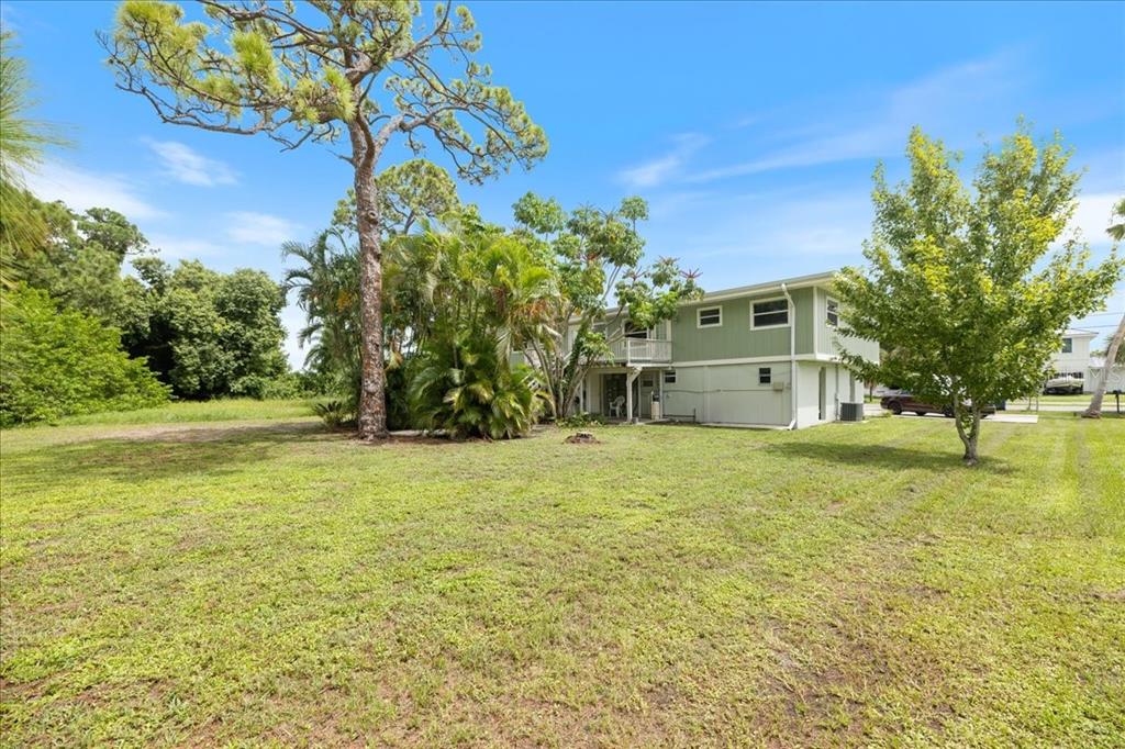 307 Winfield Way Nokomis, FL 34275 - Photo 50 of 58 a house view with a garden space