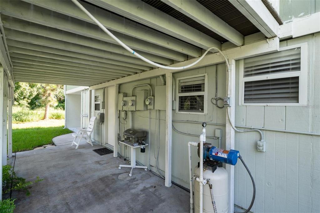 307 Winfield Way Nokomis, FL 34275 - Photo 10 of 58 a view of a porch with seating space