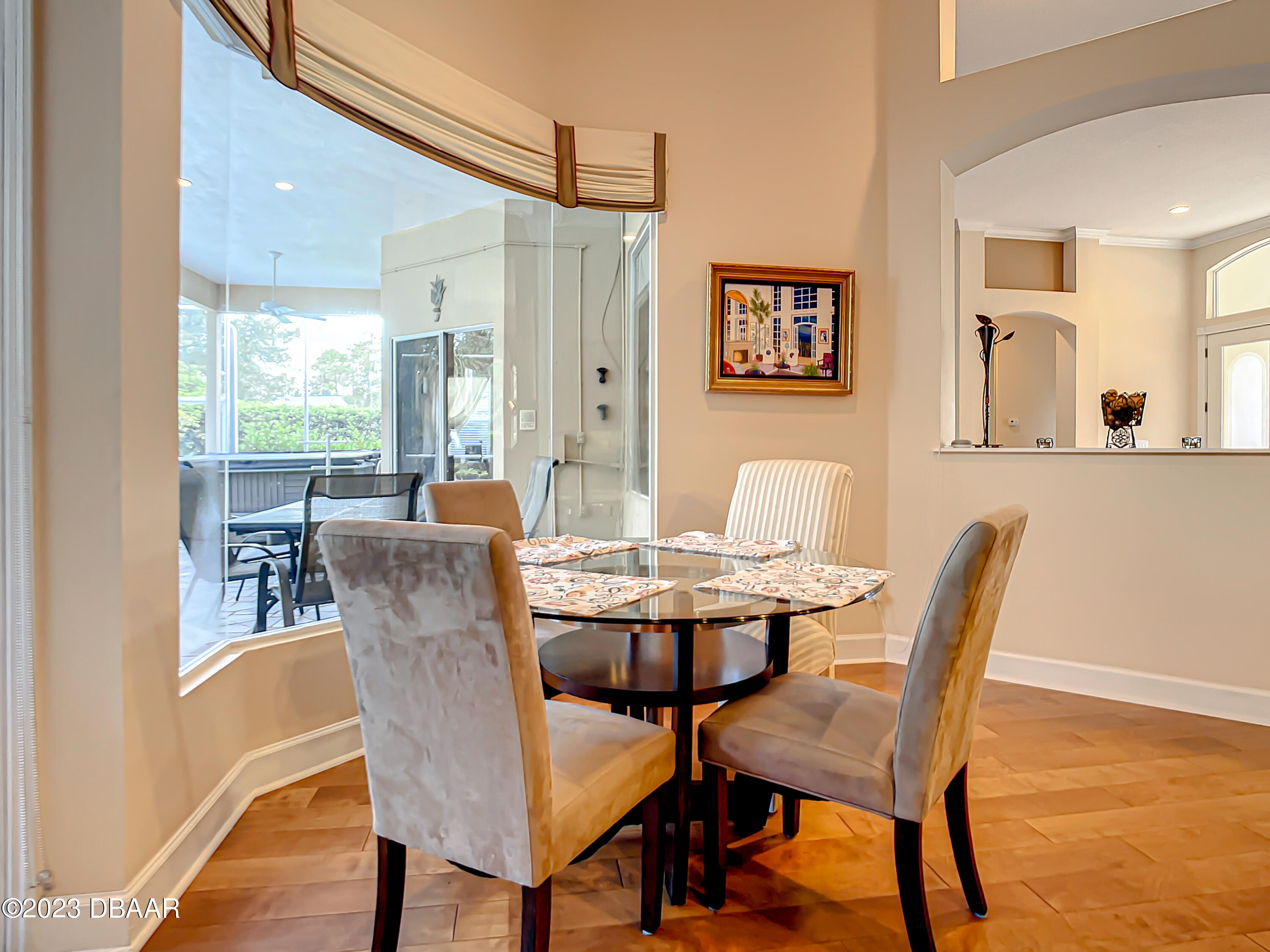 123 Deep Woods Way Ormond Beach, FL 32174 - Photo 21 of 66 a view of a dining room with furniture window and outside view