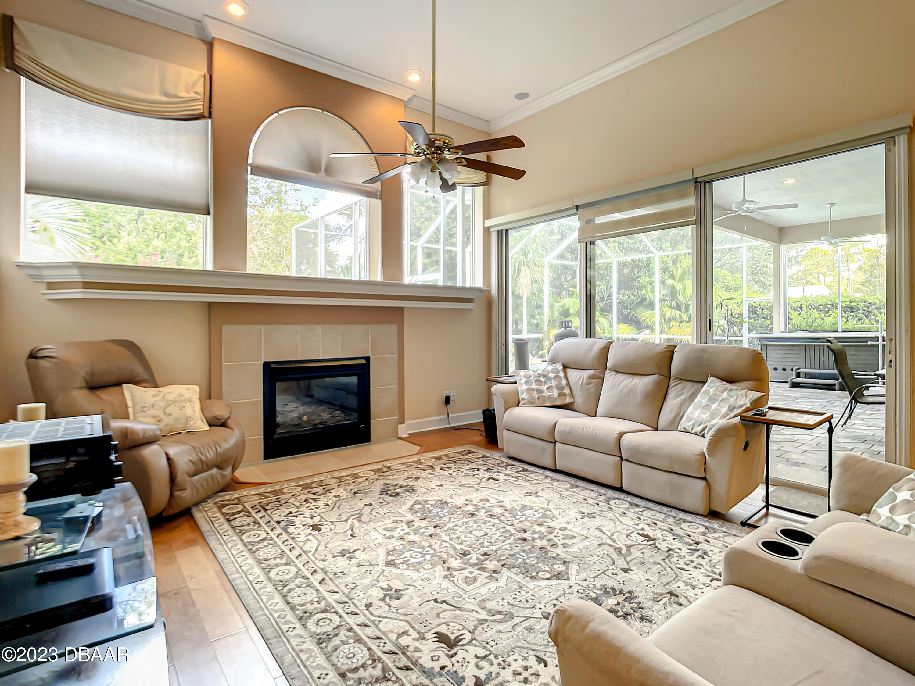123 Deep Woods Way Ormond Beach, FL 32174 - Photo 22 of 66 a living room with furniture and a fireplace