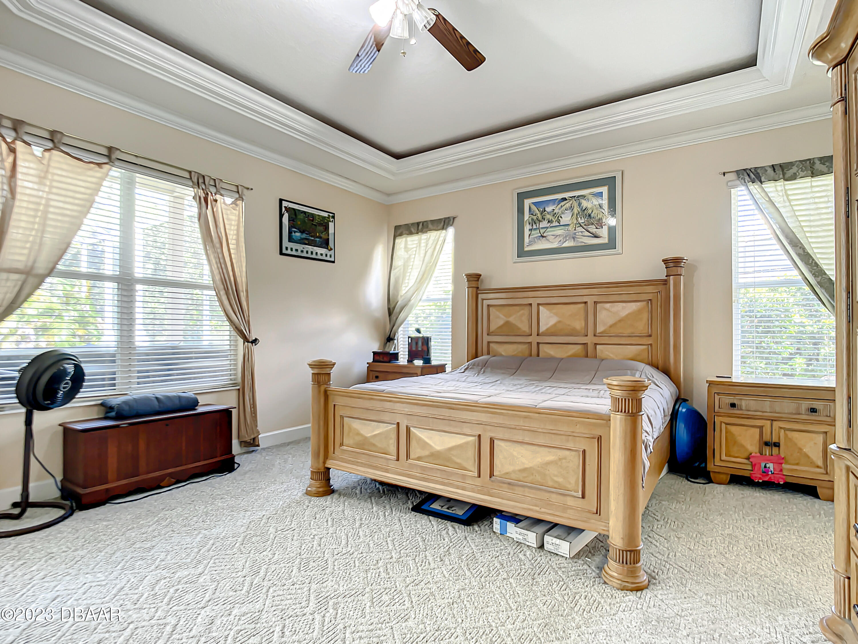 123 Deep Woods Way Ormond Beach, FL 32174 - Photo 28 of 66 a bedroom with a bed and a large window