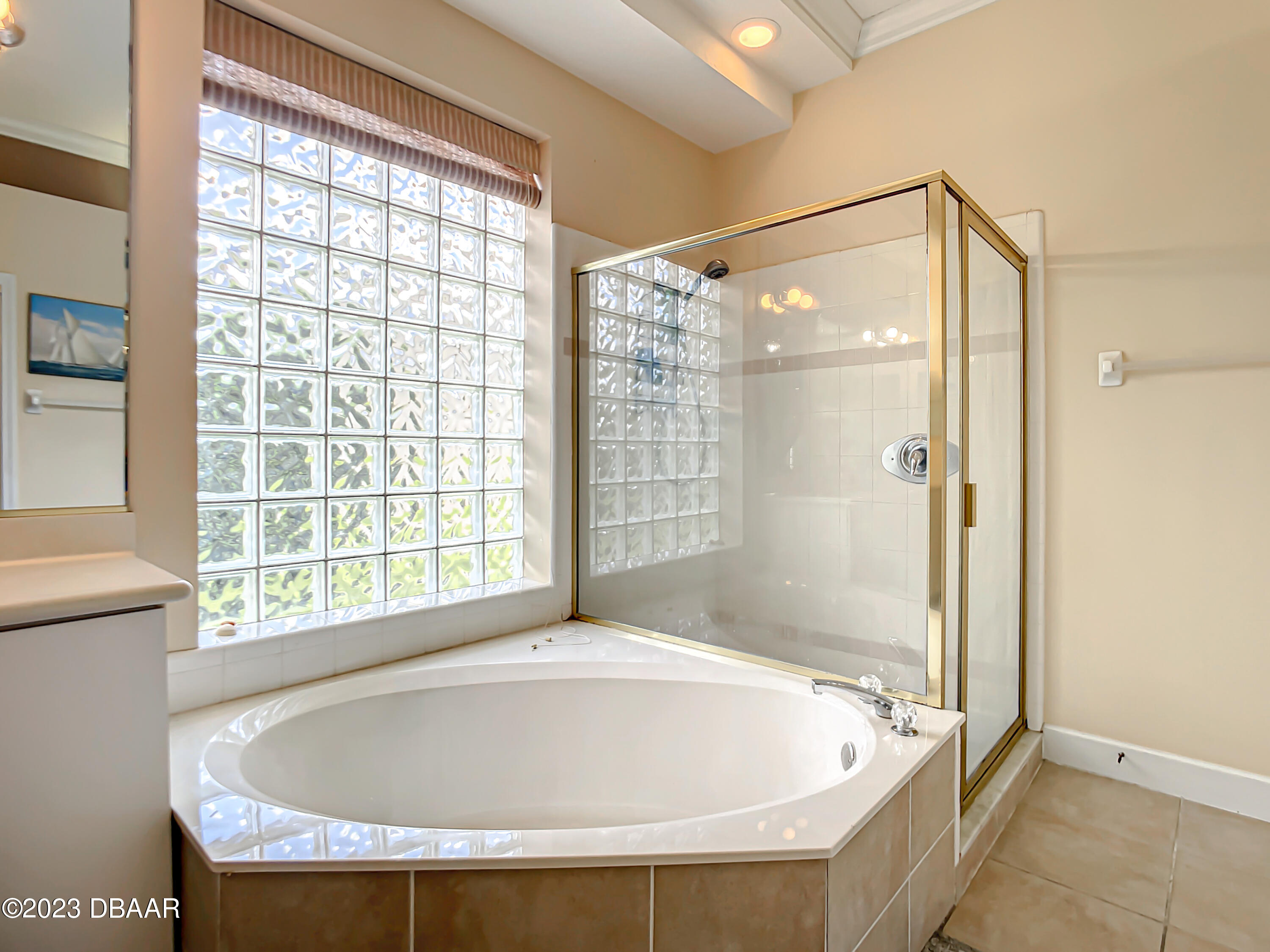 123 Deep Woods Way Ormond Beach, FL 32174 - Photo 32 of 66 a bathroom with shower and a bathtub