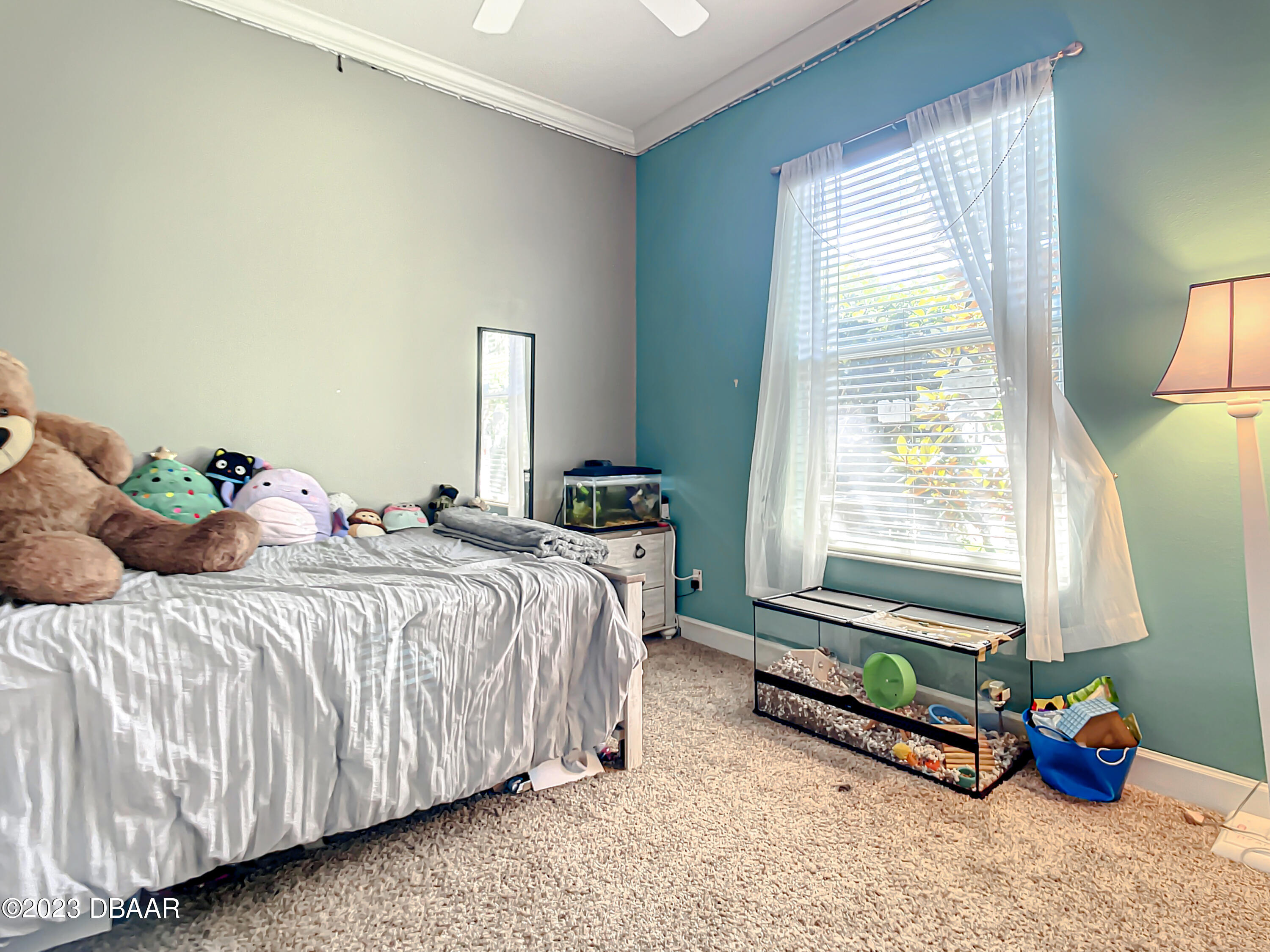 123 Deep Woods Way Ormond Beach, FL 32174 - Photo 36 of 66 a bedroom with a bed and a window