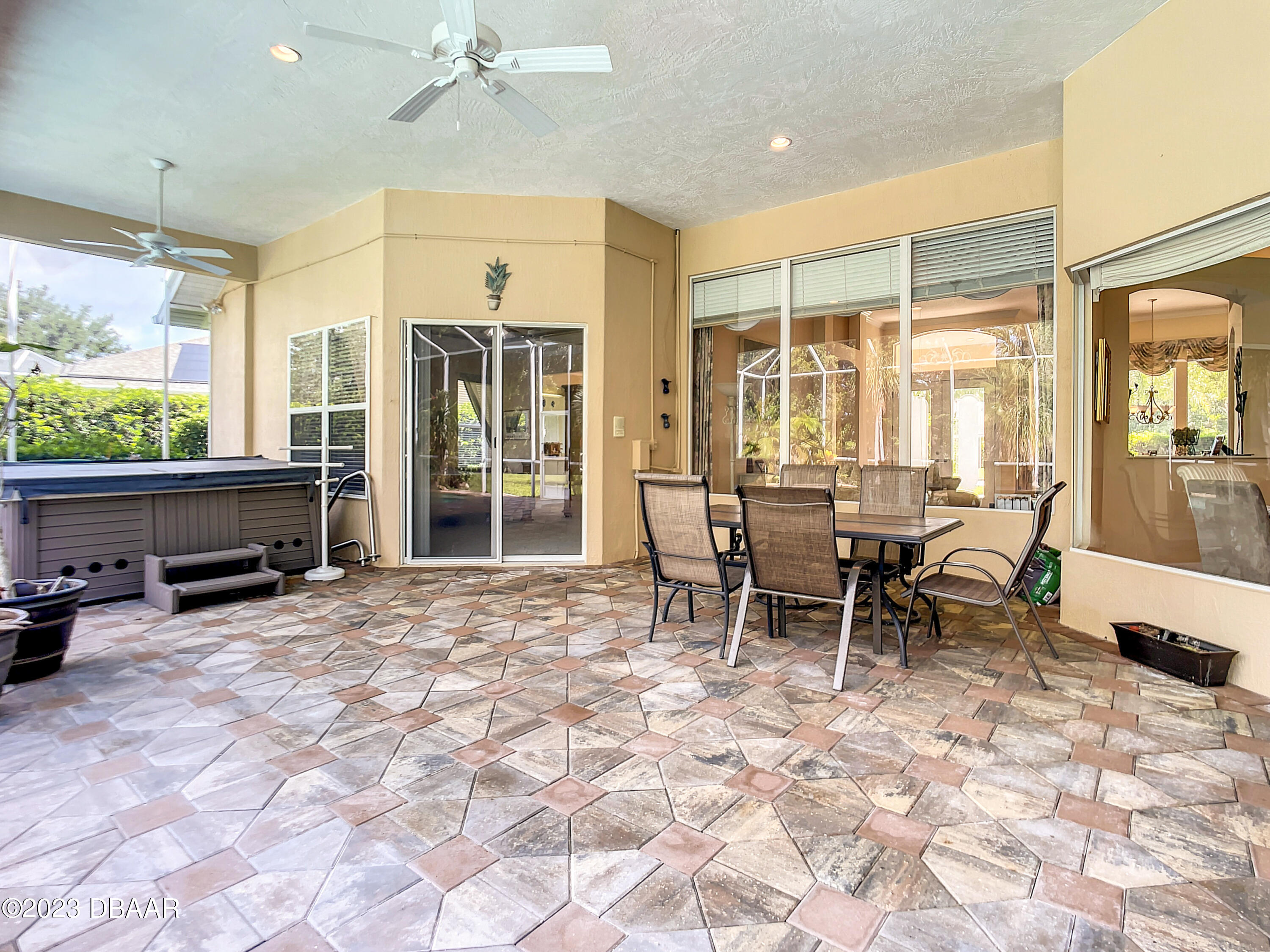 123 Deep Woods Way Ormond Beach, FL 32174 - Photo 48 of 66 a view of a dining room with furniture window and outside view