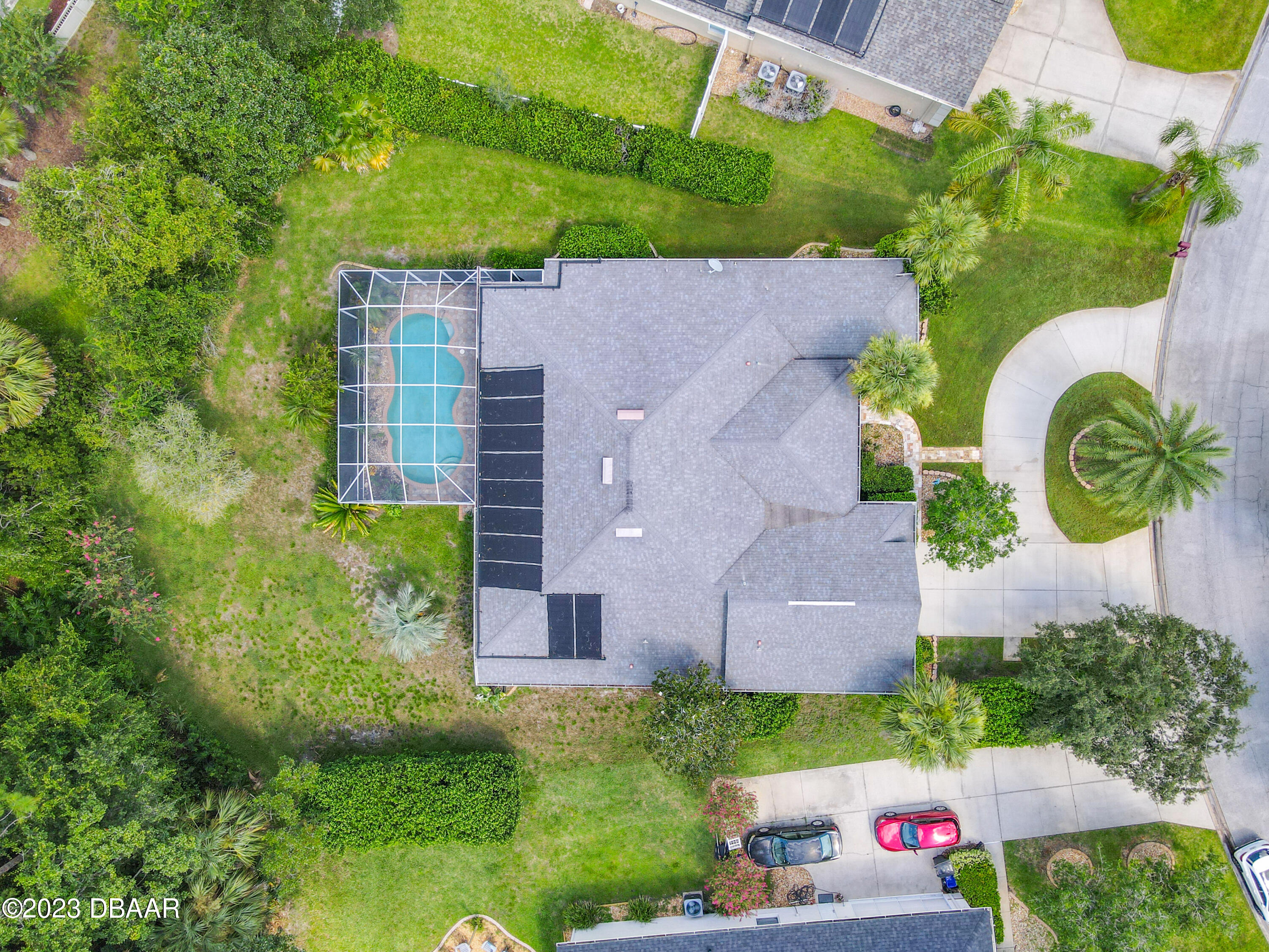123 Deep Woods Way Ormond Beach, FL 32174 - Photo 61 of 66 an aerial view of a house with a yard and lake view
