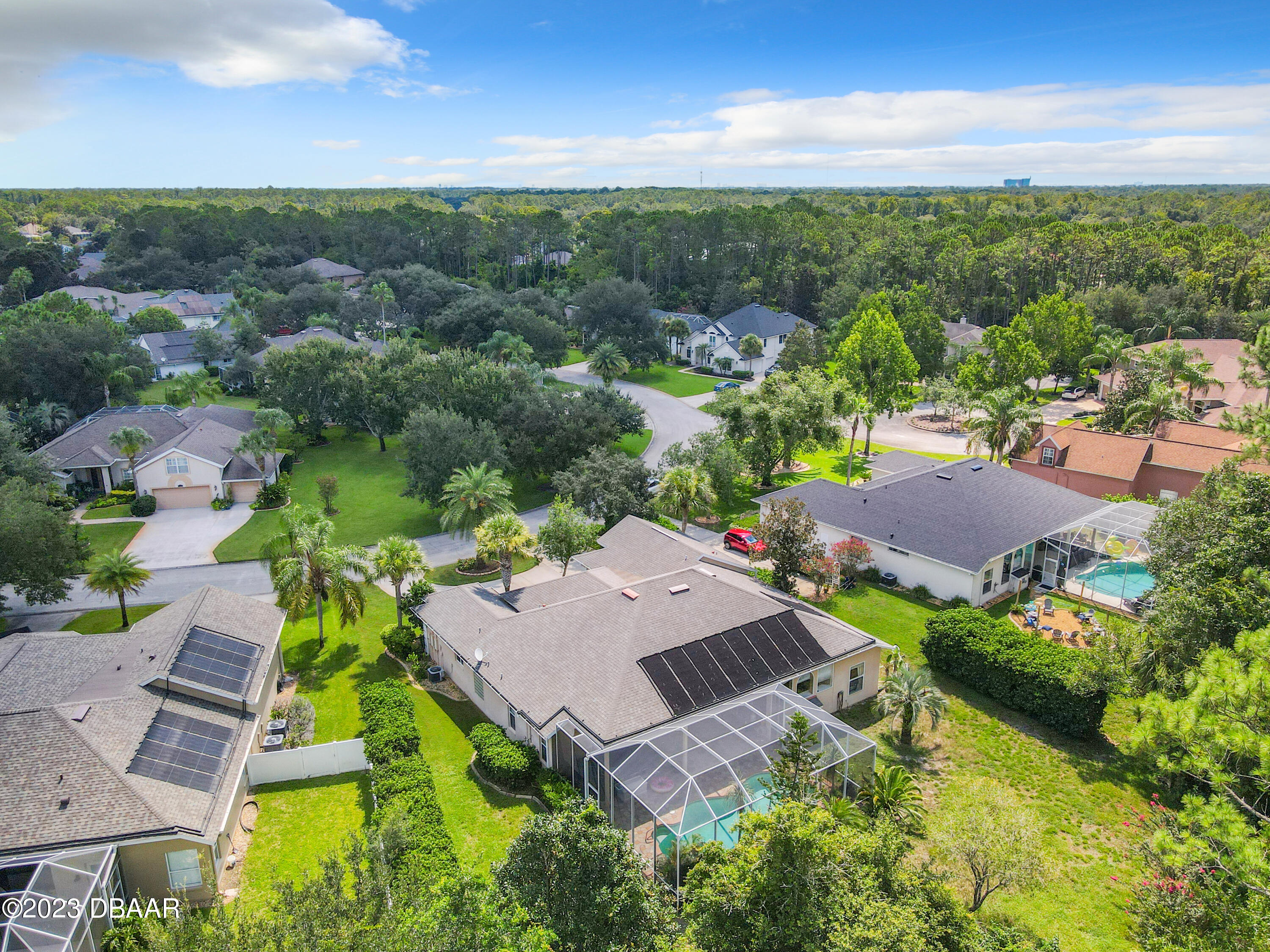 123 Deep Woods Way Ormond Beach, FL 32174 - Photo 62 of 66 an aerial view of a house with a garden
