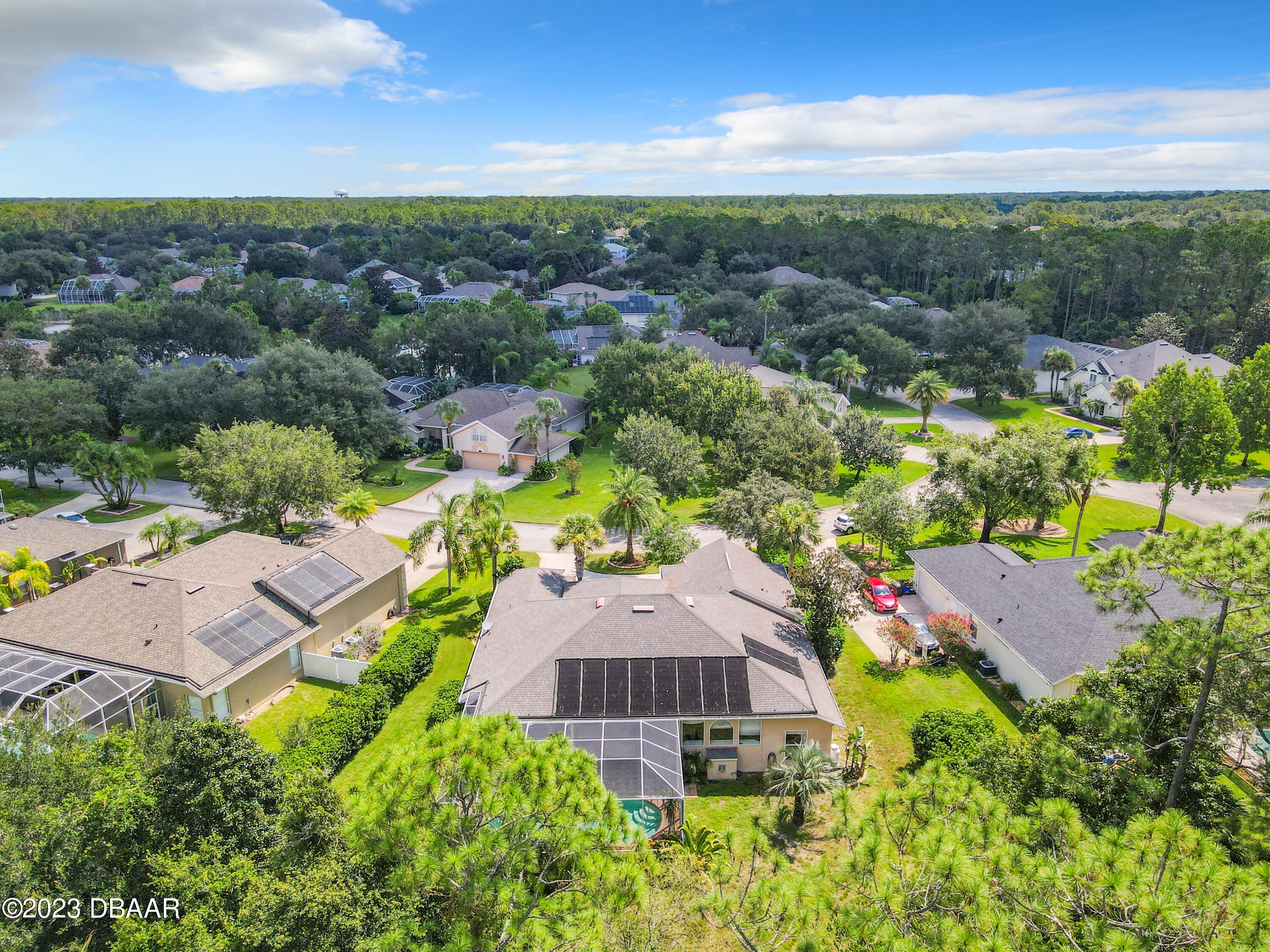 123 Deep Woods Way Ormond Beach, FL 32174 - Photo 63 of 66 an aerial view of residential houses with outdoor space and ocean view