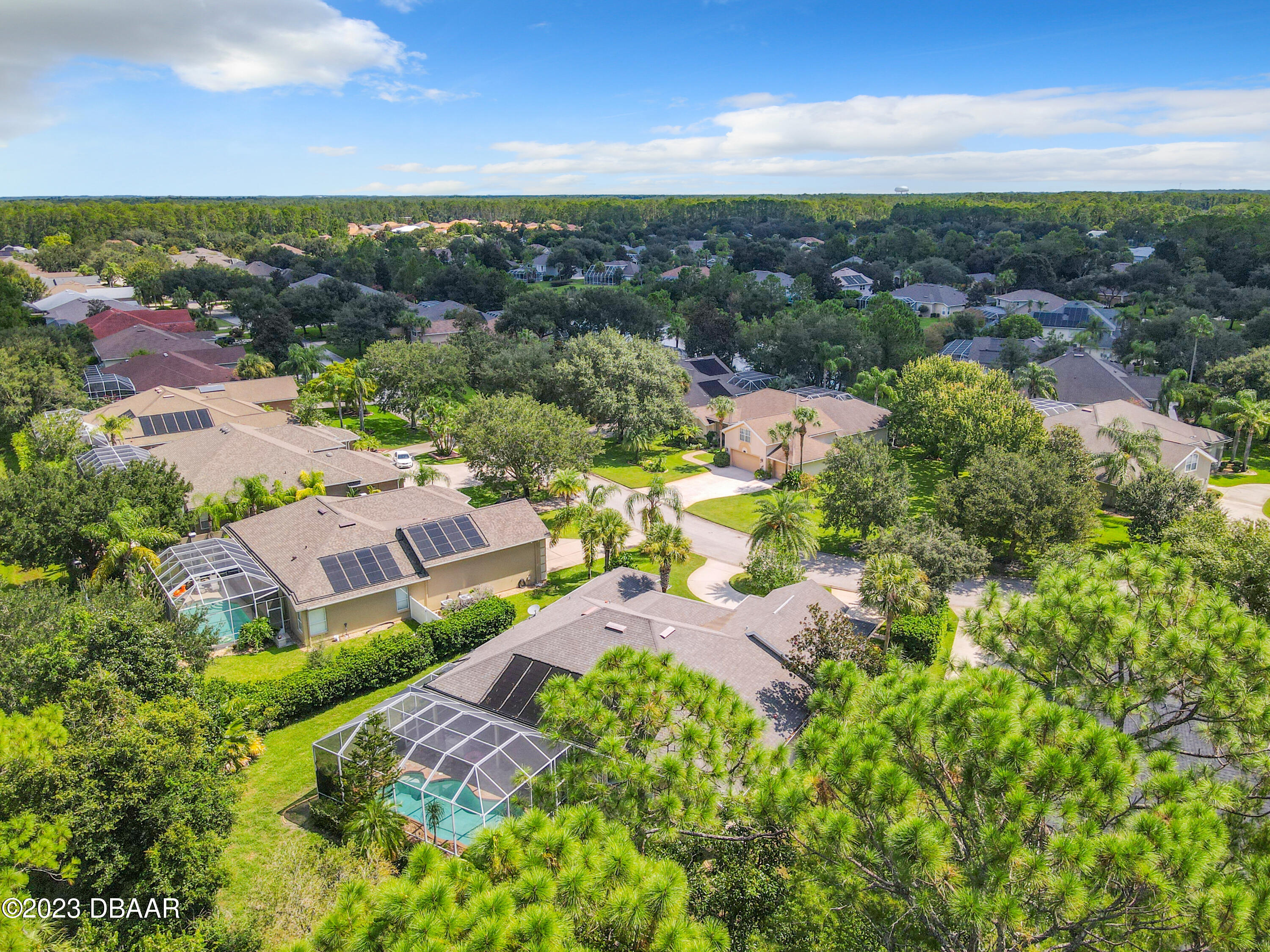 123 Deep Woods Way Ormond Beach, FL 32174 - Photo 64 of 66 an aerial view of residential houses with outdoor space and ocean view