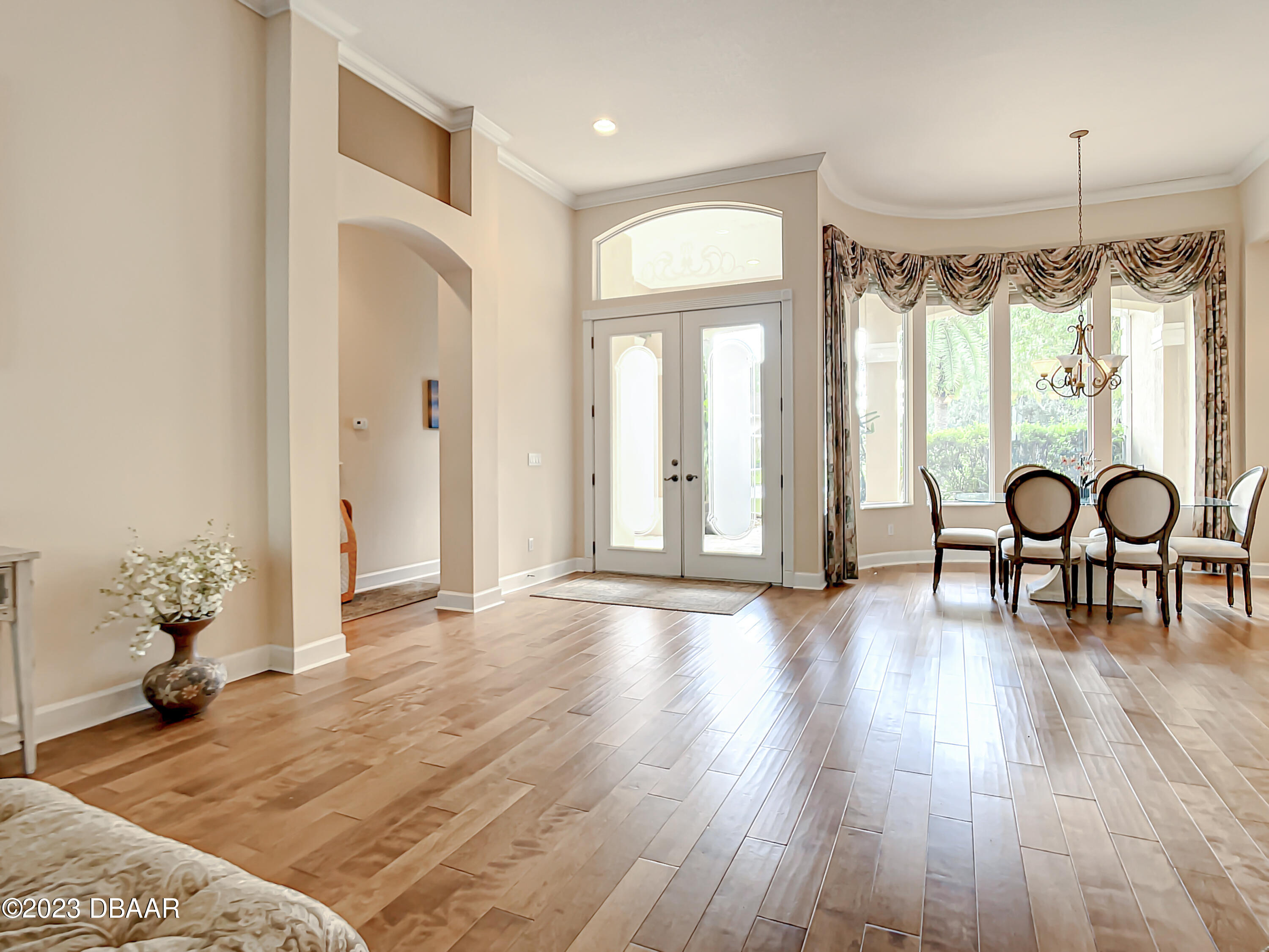 123 Deep Woods Way Ormond Beach, FL 32174 - Photo 8 of 66 a view of a livingroom with furniture window and wooden floor