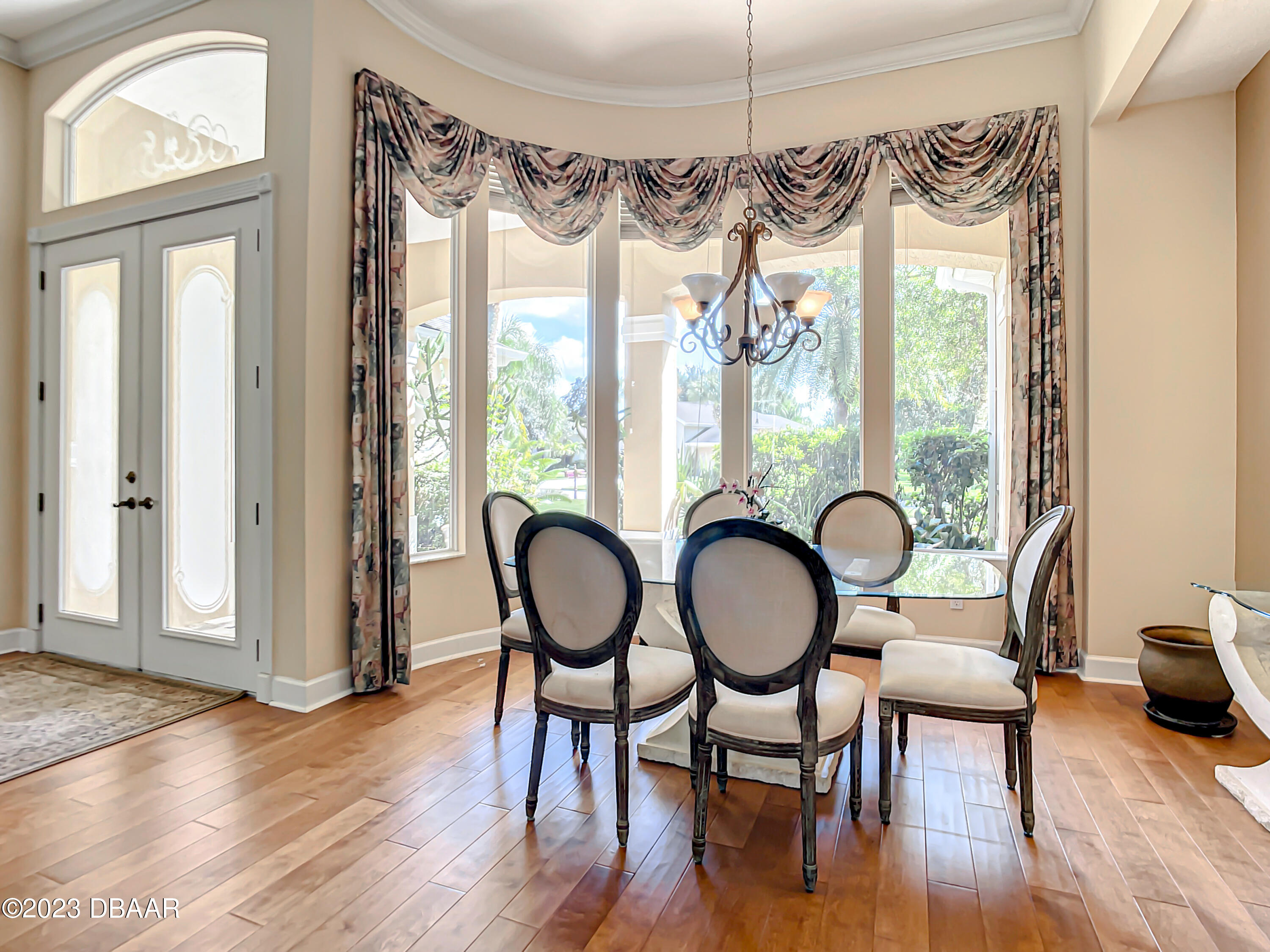 123 Deep Woods Way Ormond Beach, FL 32174 - Photo 10 of 66 a view of a room with furniture window and wooden floor