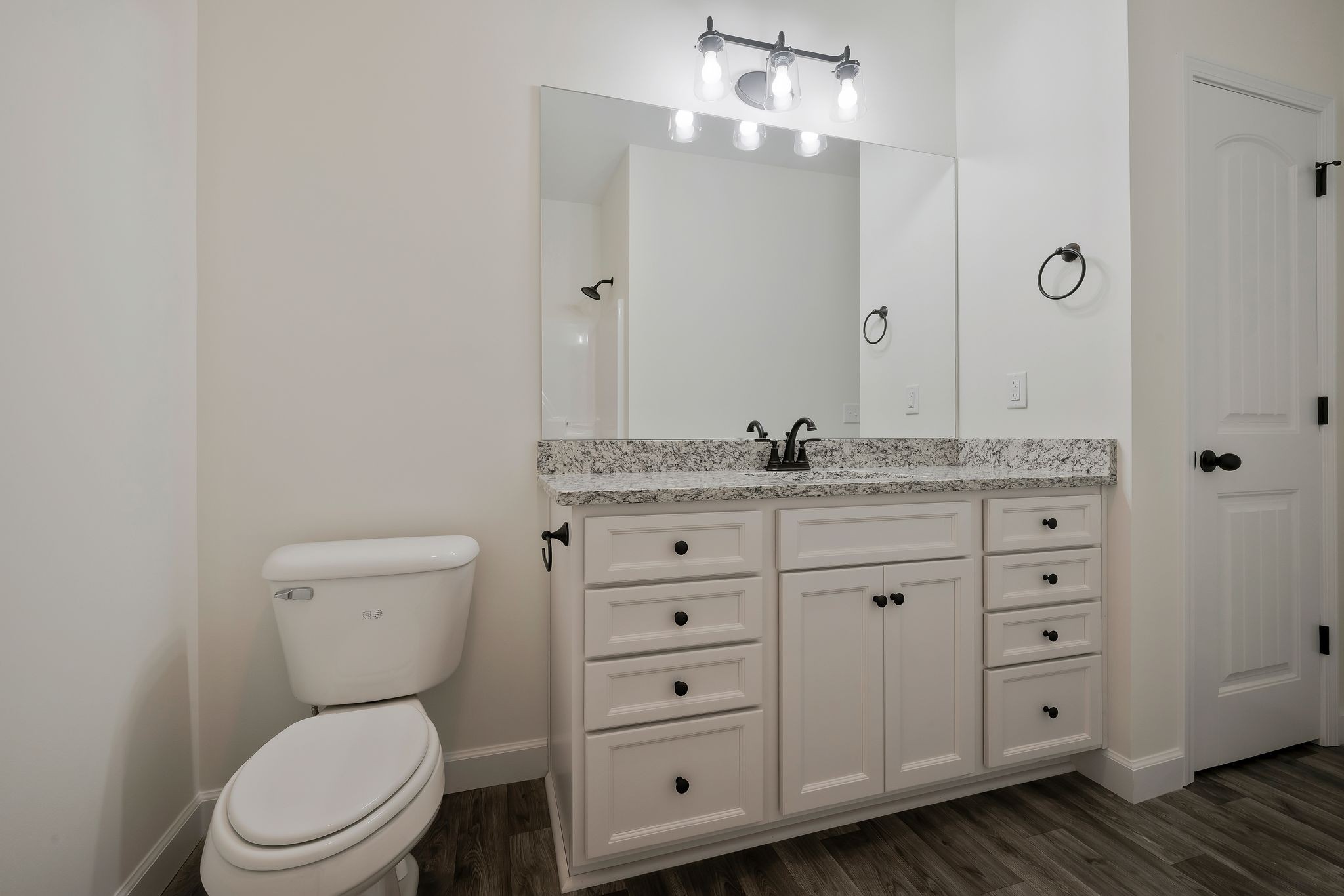 845 Lucas Road Dickson, TN 37055 - Photo 20 of 31 a bathroom with a granite countertop toilet sink and mirror