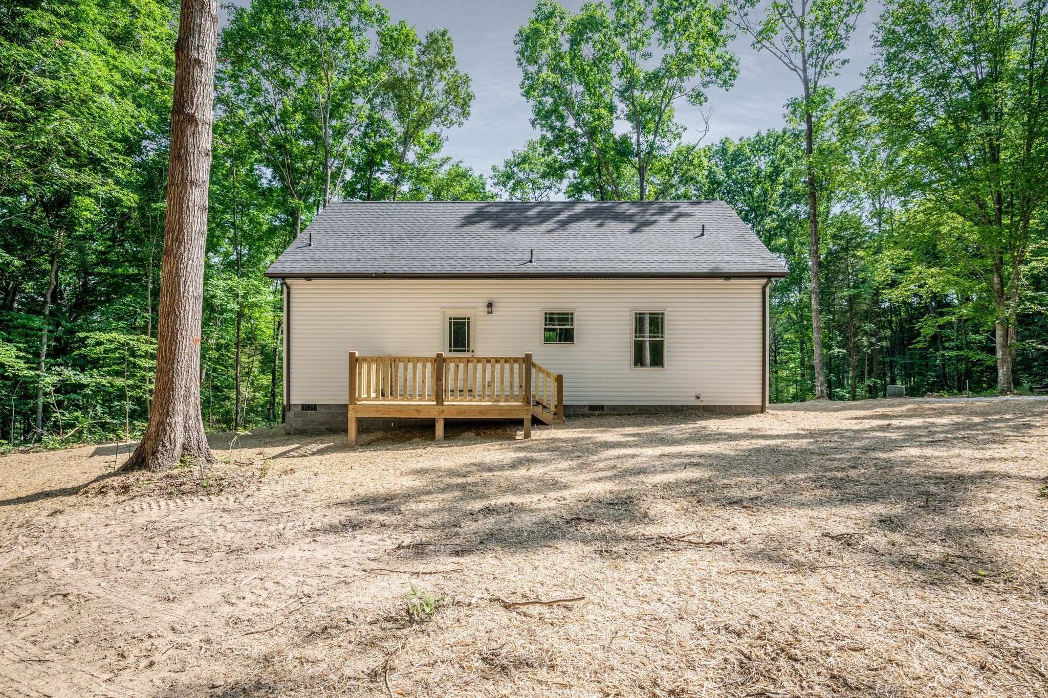 845 Lucas Road Dickson, TN 37055 - Photo 29 of 31 a house with trees in the background