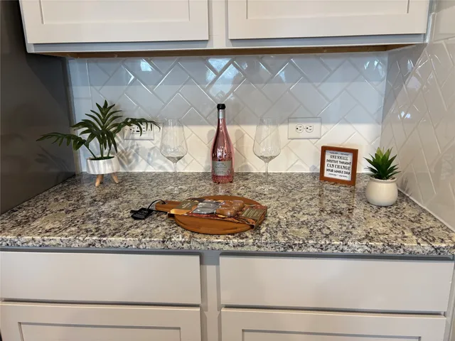 a sink with granite counter top