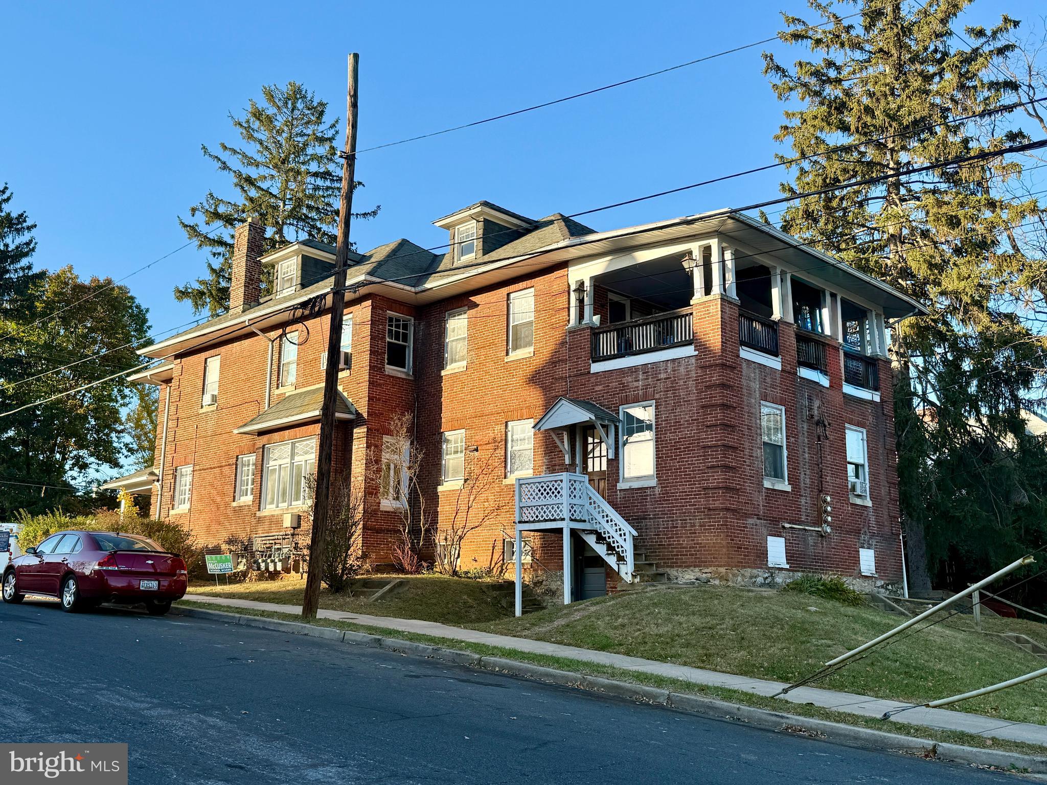 460 Summit Avenue Hagerstown, MD 21740 - Photo 5 of 8 a front view of a house with a yard