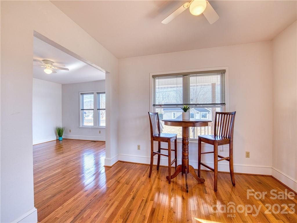 947 North Canton Road Canton, NC 28716 - Photo 12 of 24 a dining room with furniture and wooden floor