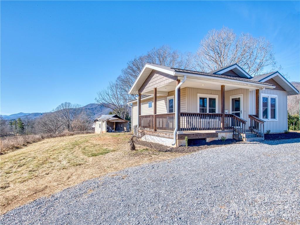 947 North Canton Road Canton, NC 28716 - Photo 2 of 24 a view of house with a yard