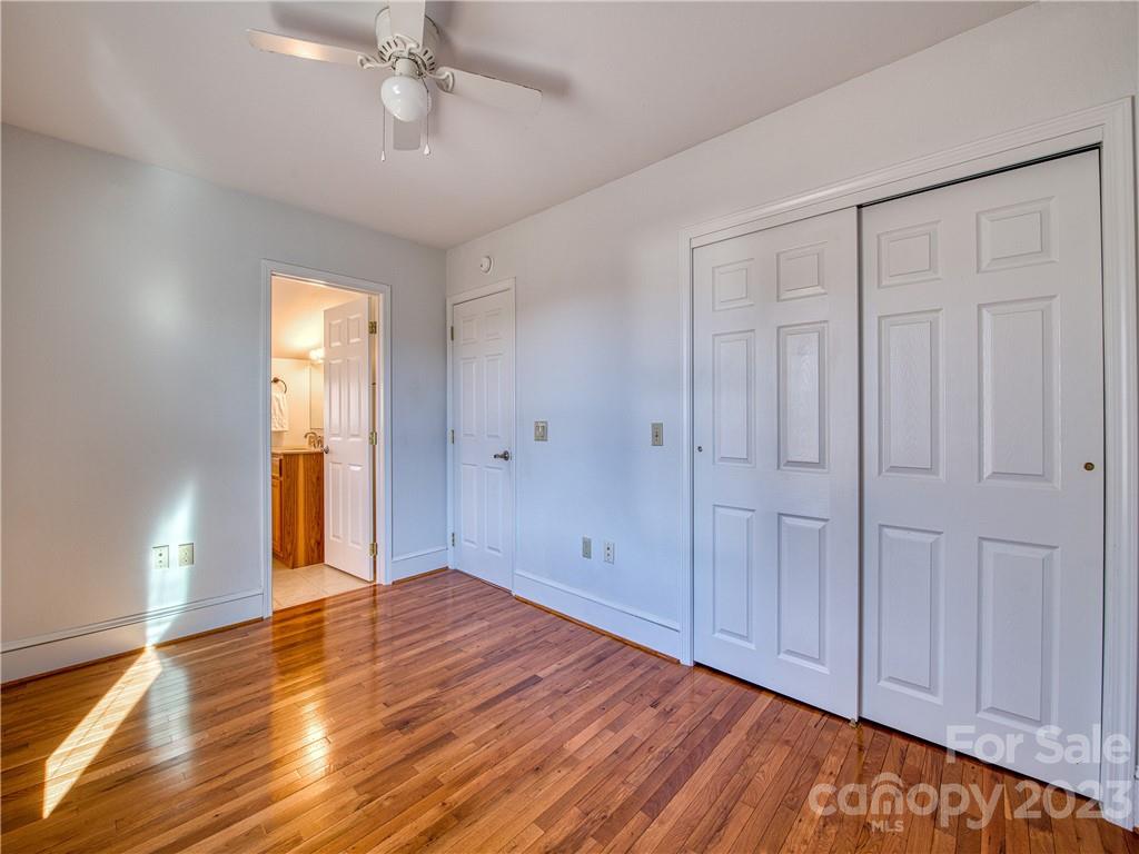 947 North Canton Road Canton, NC 28716 - Photo 21 of 24 a view of an empty room with wooden floor