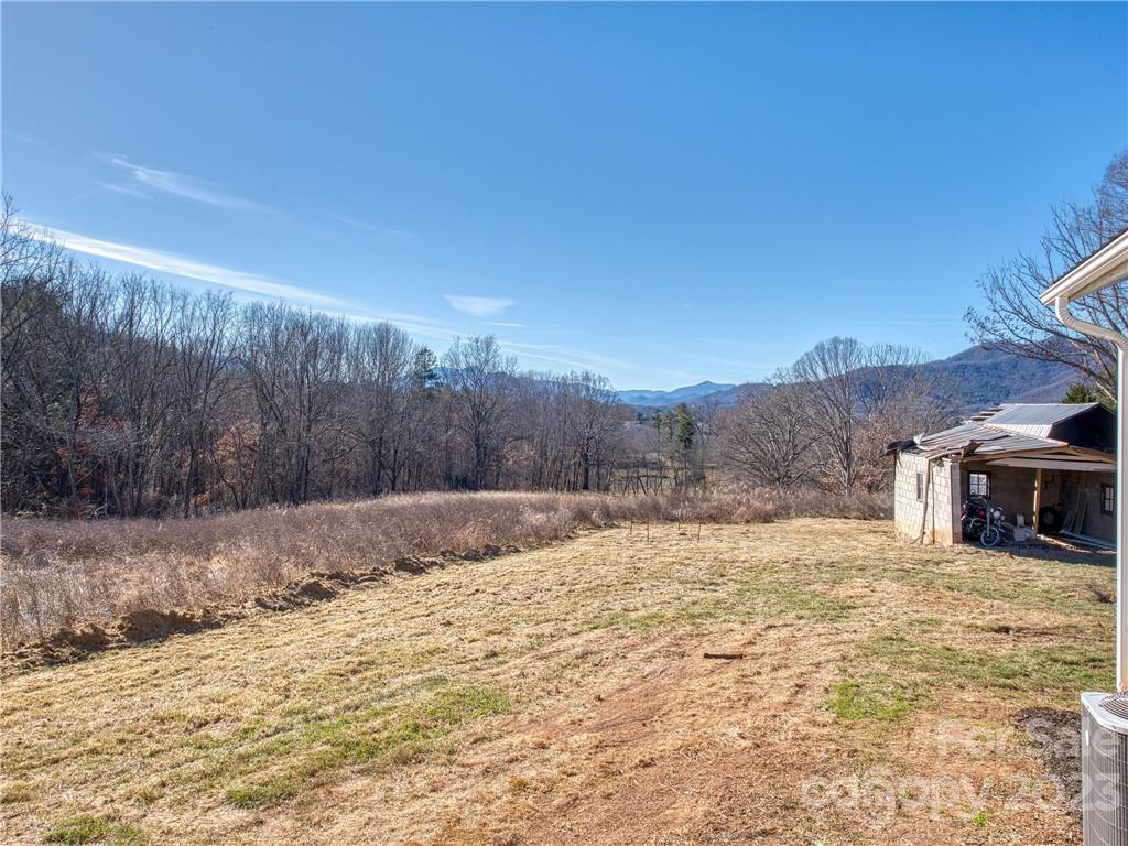 947 North Canton Road Canton, NC 28716 - Photo 7 of 24 a swimming pool with mountain view