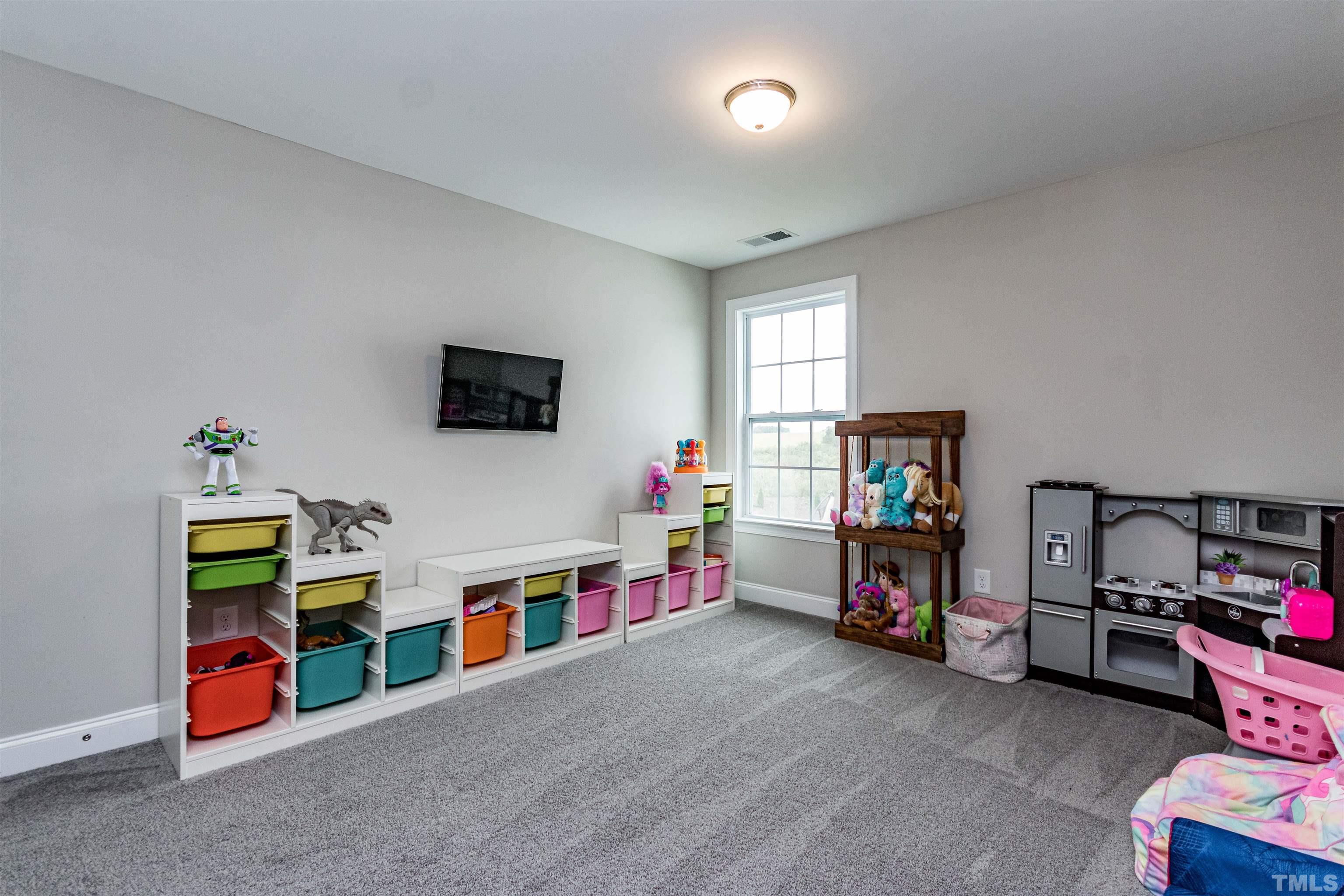 460 Mallard Loop Drive Clayton, NC 27527 - Photo 16 of 24 a children room with toys