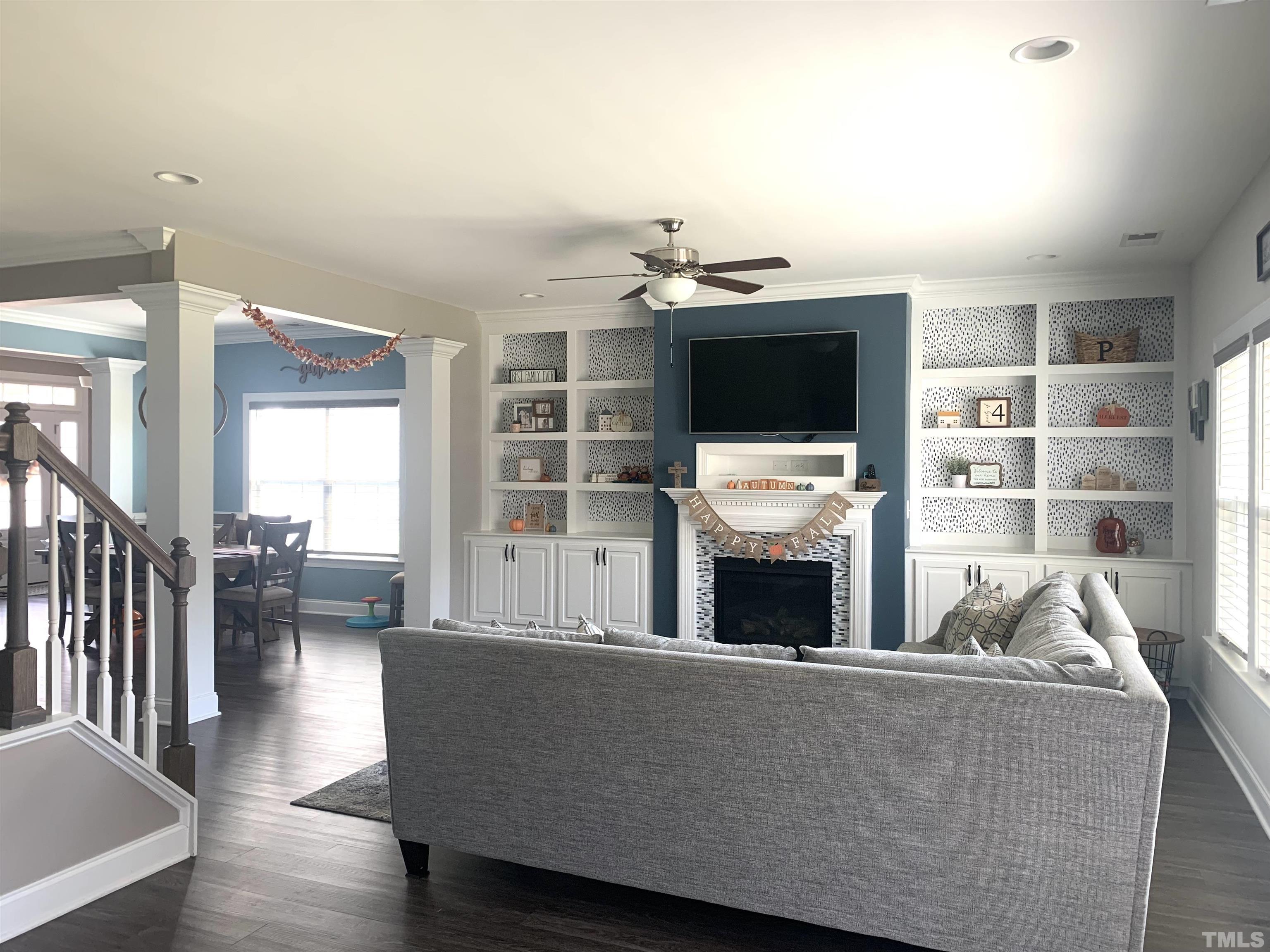 460 Mallard Loop Drive Clayton, NC 27527 - Photo 3 of 24 a living room with furniture and a flat screen tv